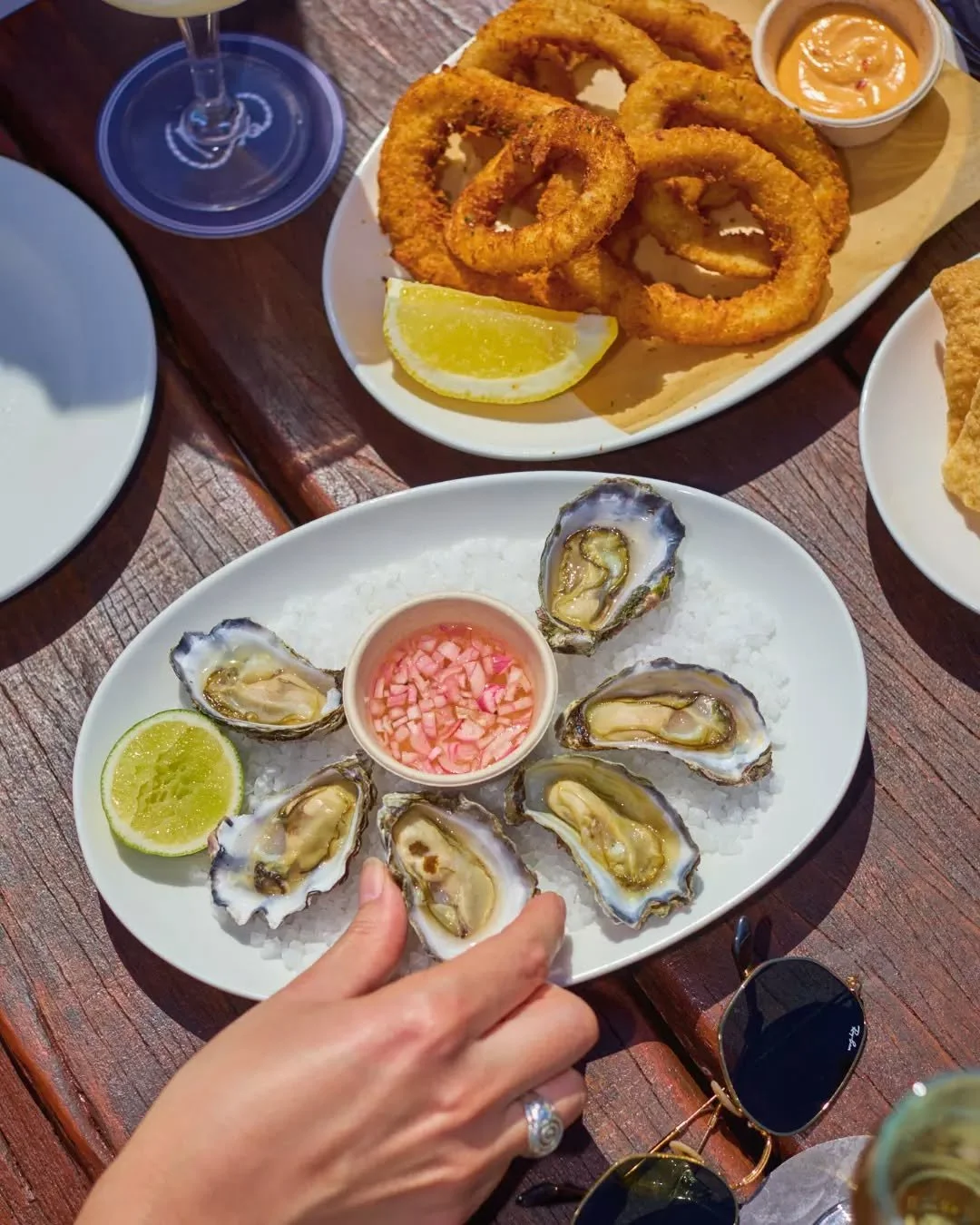 Friday calls for fresh oysters and something crisp in hand. Settle in and make a long lunch of it.