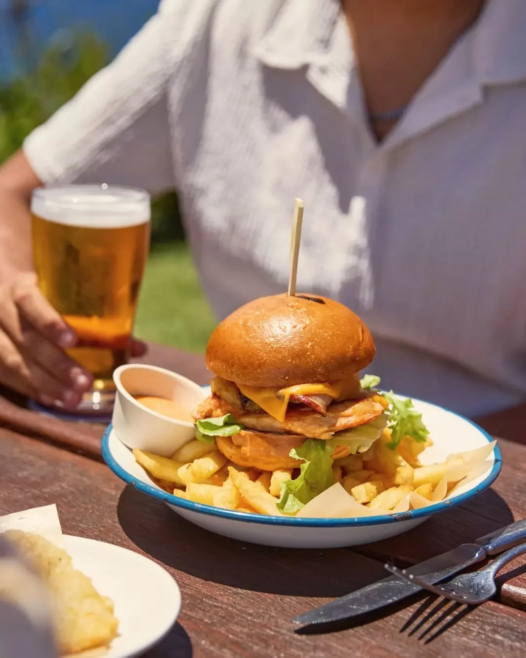 If you&rsquo;re looking for a sign to skip the kitchen today, this is it. We&rsquo;re serving up our signature burgers for $22 all day - the perfect excuse to head to the clifftop for a mid-week feed.

Pair it with a cold drink and unmatched views ov