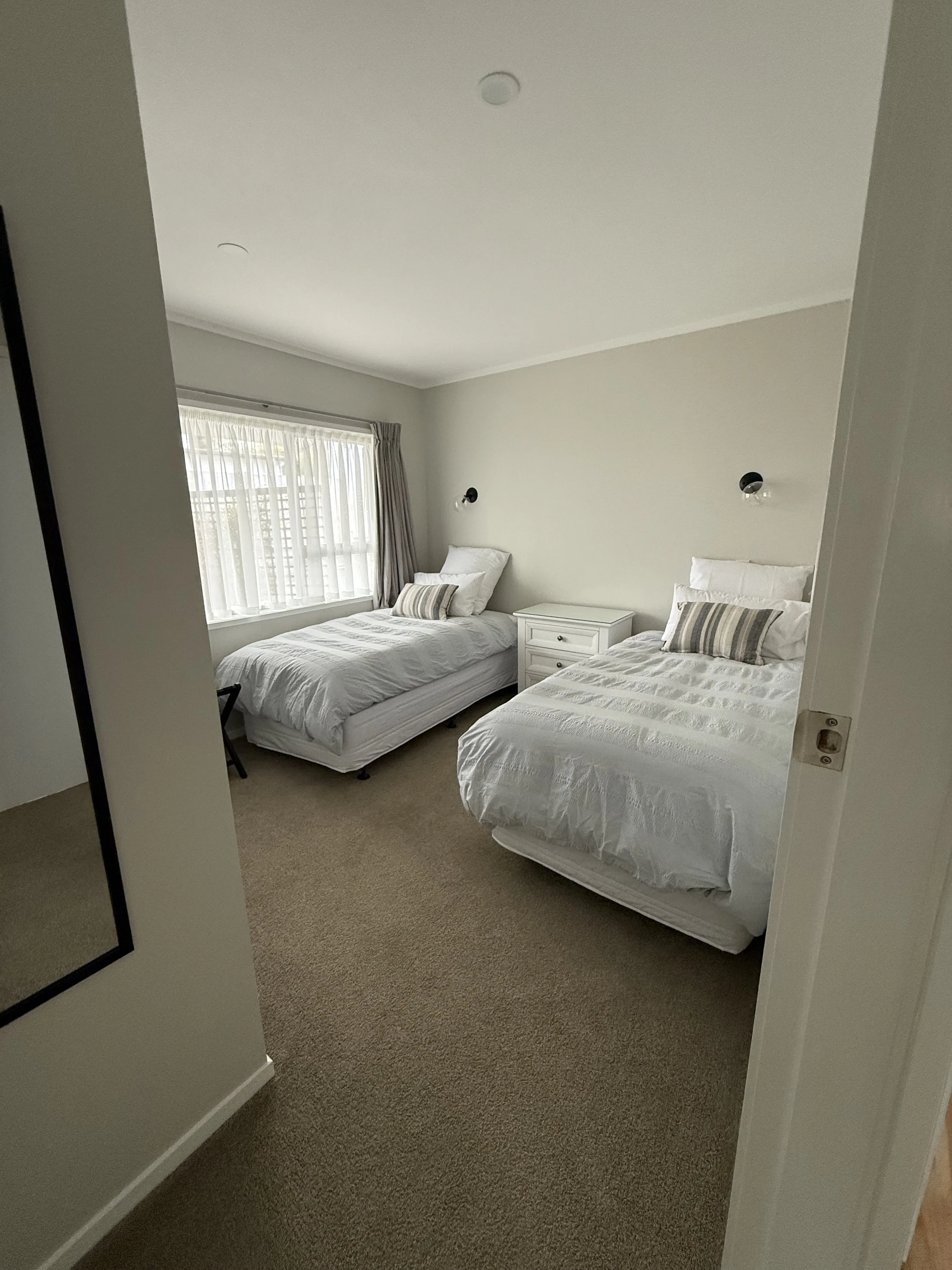 Wallpaper stripped throughout house, skim plaster and paint.