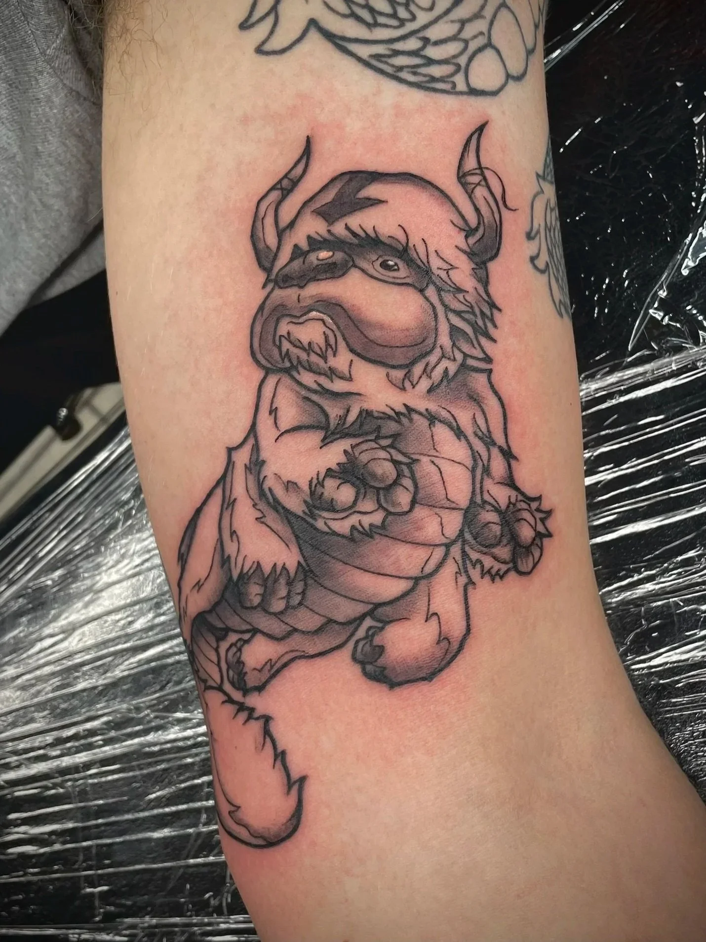 Line art tattoo of Appa from the last air bender, tattooed by Zing Phelps, in Cedar Rapids, Iowa