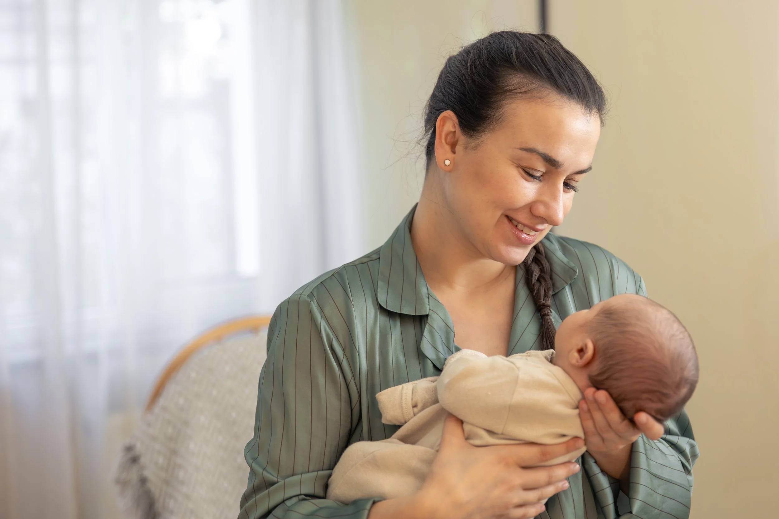 Mother holds baby boy