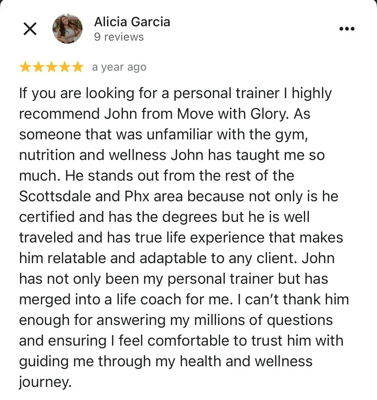 Screenshot of a review for a personal trainer named John from Move with Glory, praising his certification, experience, and personalized coaching in health and wellness.