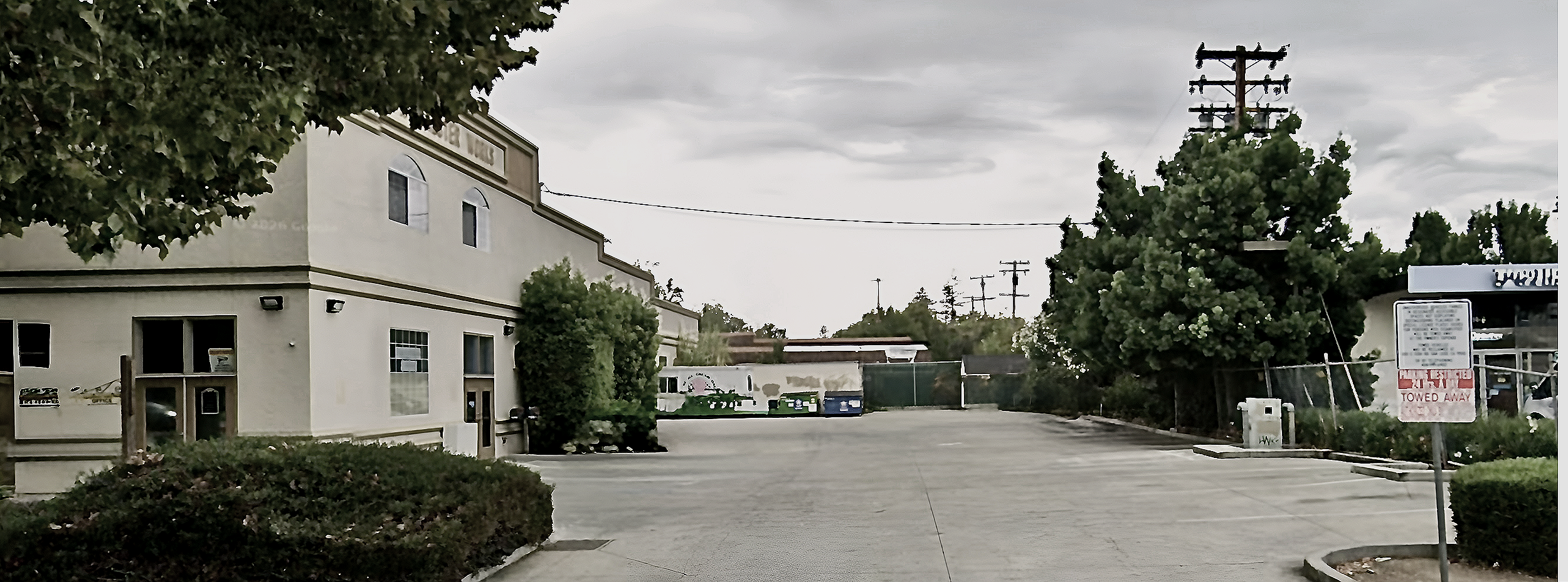 "Free on-site customer parking lot at Grayscale Barbershop in San Jose."