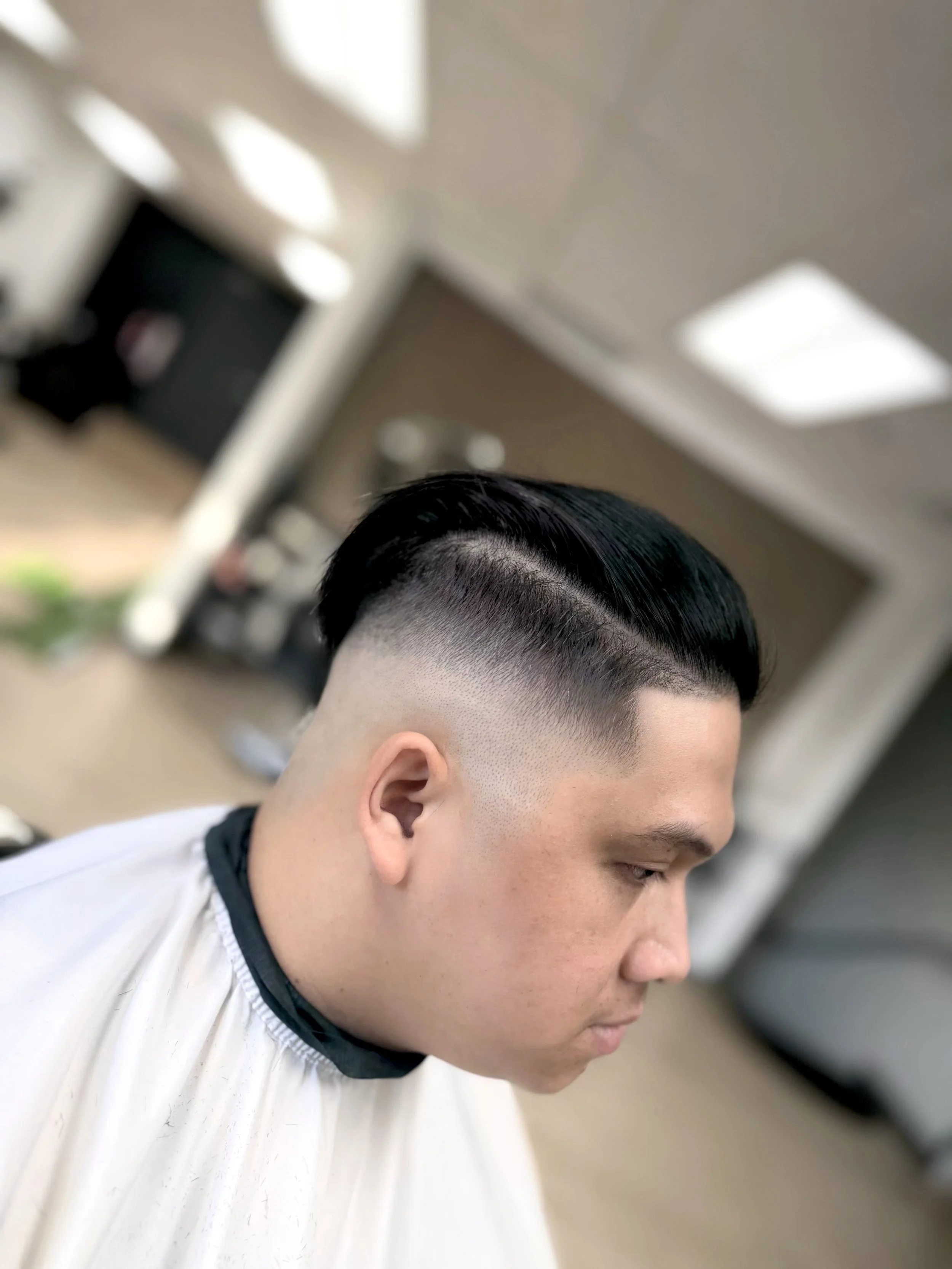 Mid high skin fade with a line-up