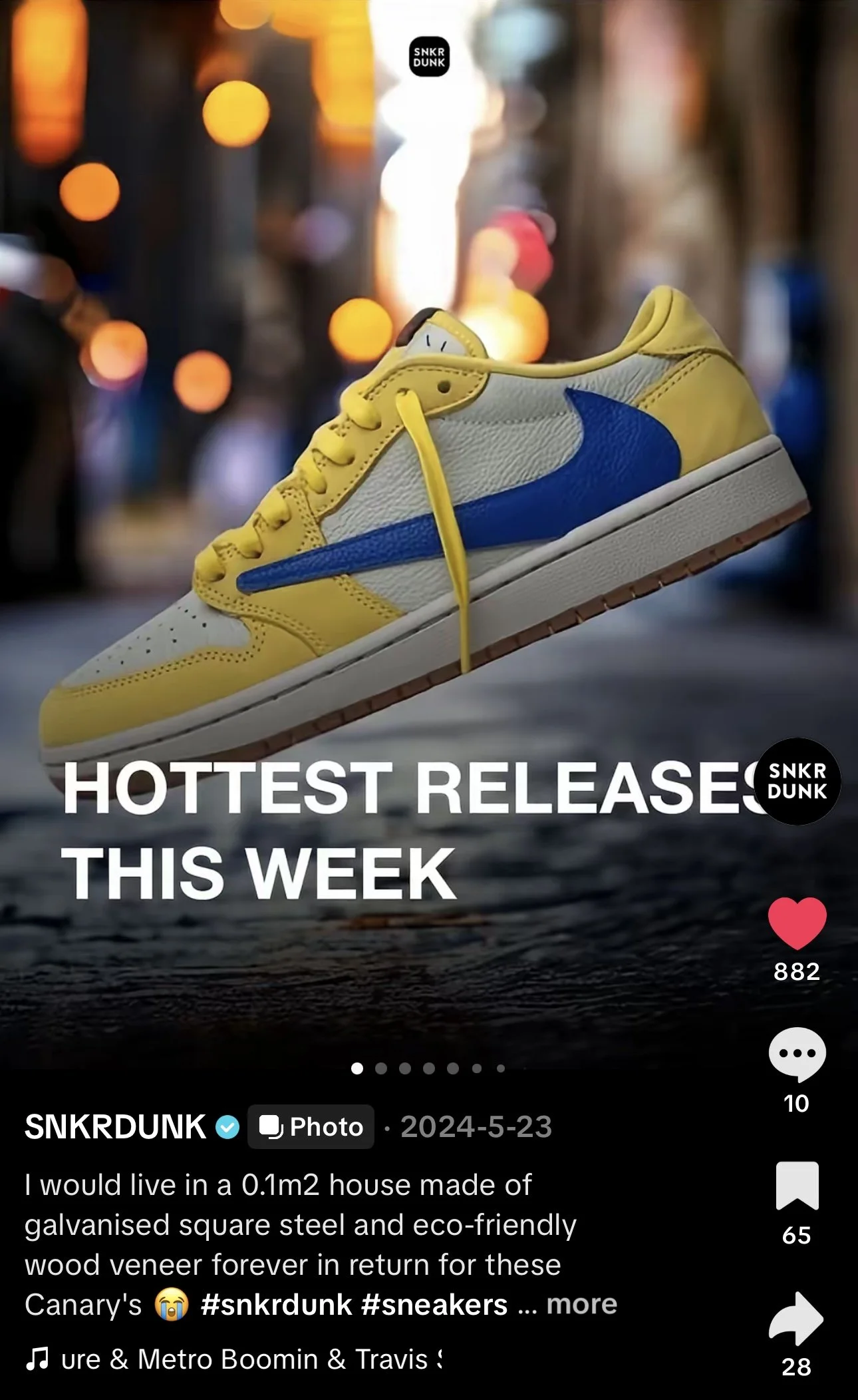 A yellow and white sneaker with a blue Nike swoosh logo, floating in mid-air against a blurred city street background at night.