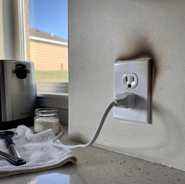 What Causes a Burning Smell From an Outlet? 6 Warning Signs