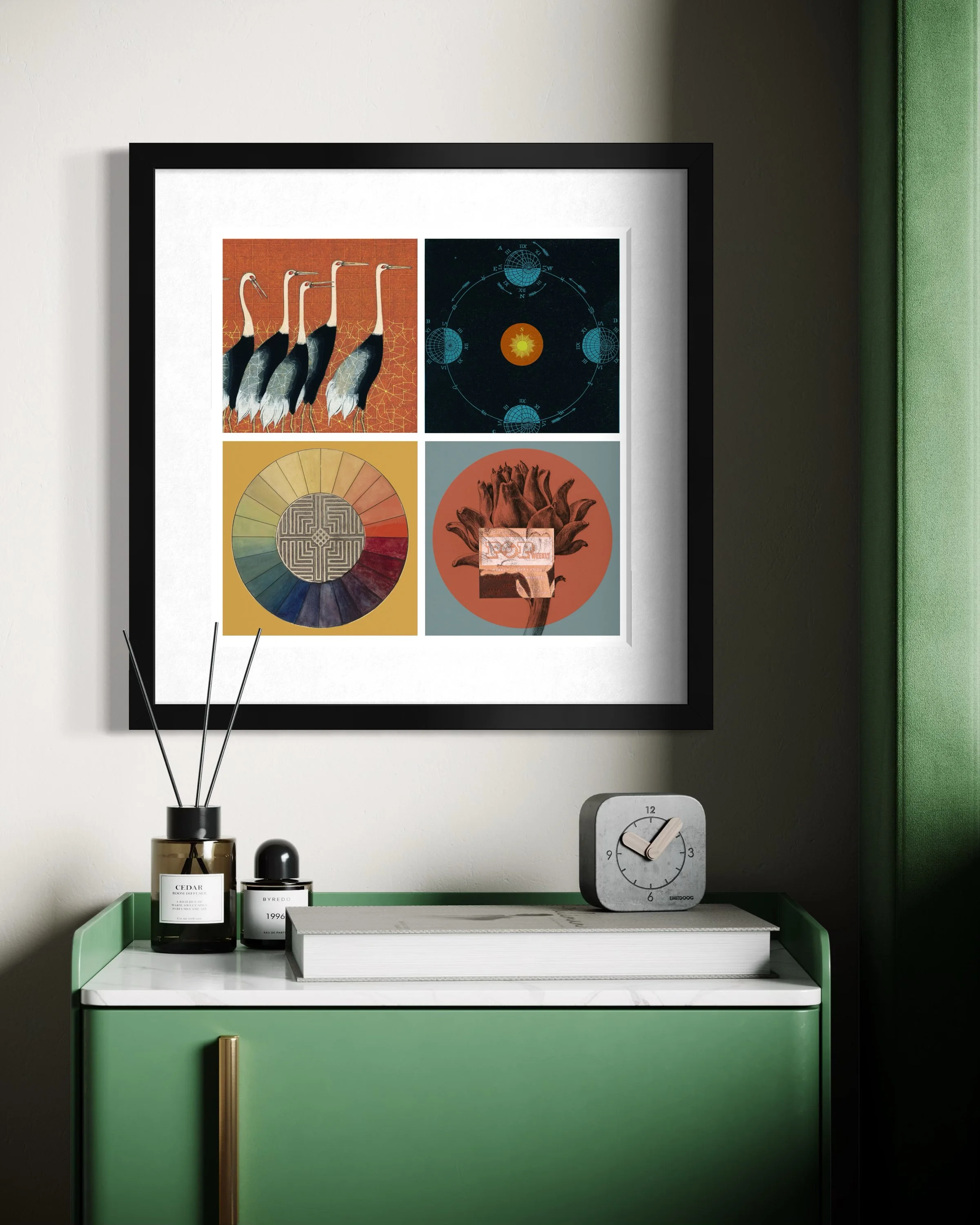 Memory Atlas fine-art print in a black gallery frame displayed on a cream wall above a console table with reed diffusers, a small clock and green accent details