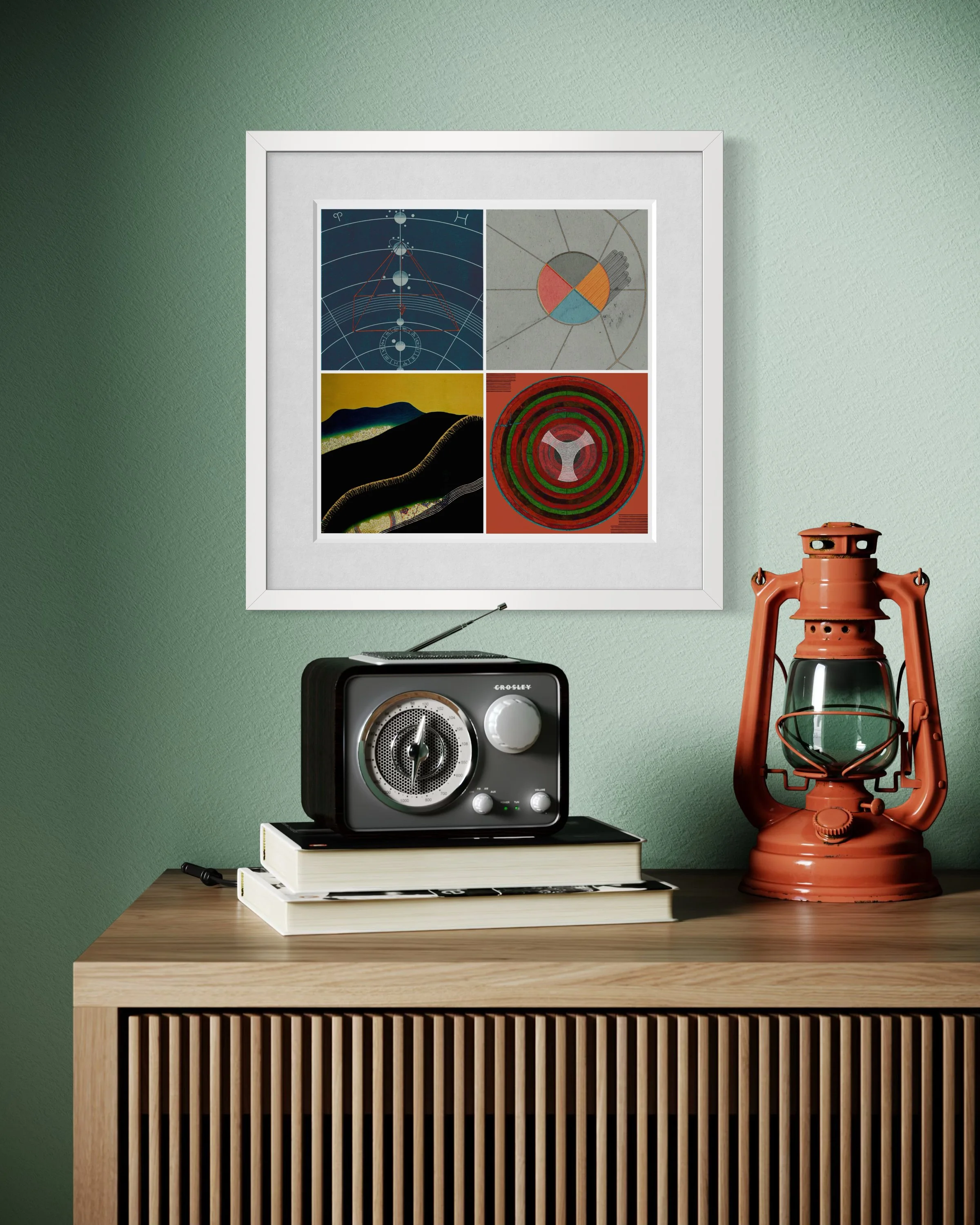 Ceremony fine-art print in a white gallery frame displayed on a mint-green wall above a wooden surface with a vintage radio, stacked books and an orange lantern