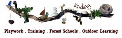 Decorative sign with natural elements spelling 'kindling' and listing 'Playwork, Training, Forest Schools, Outdoor Learning'.