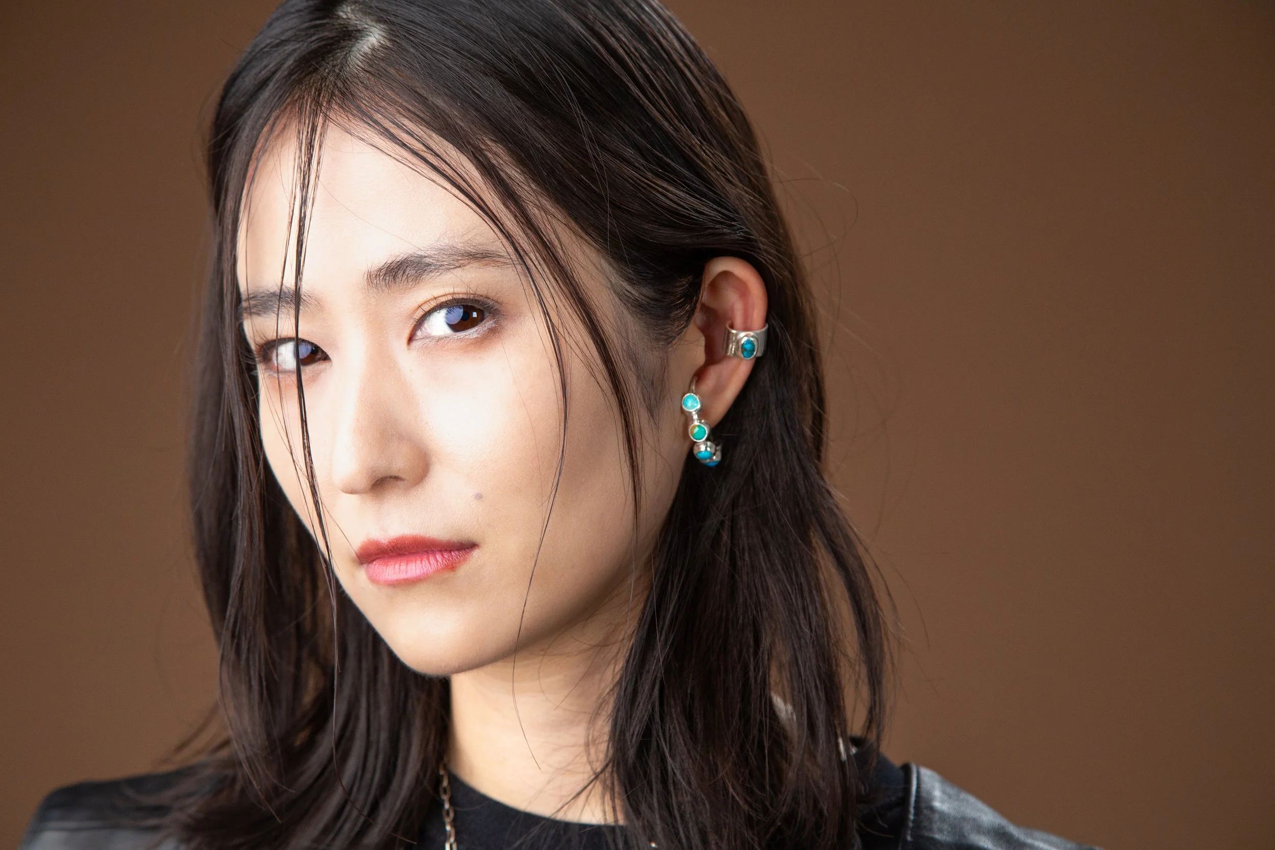 Professional portrait of model Yui Koike photographed for Sycamore 2025 featuring natural lighting and warm atmospheric composition