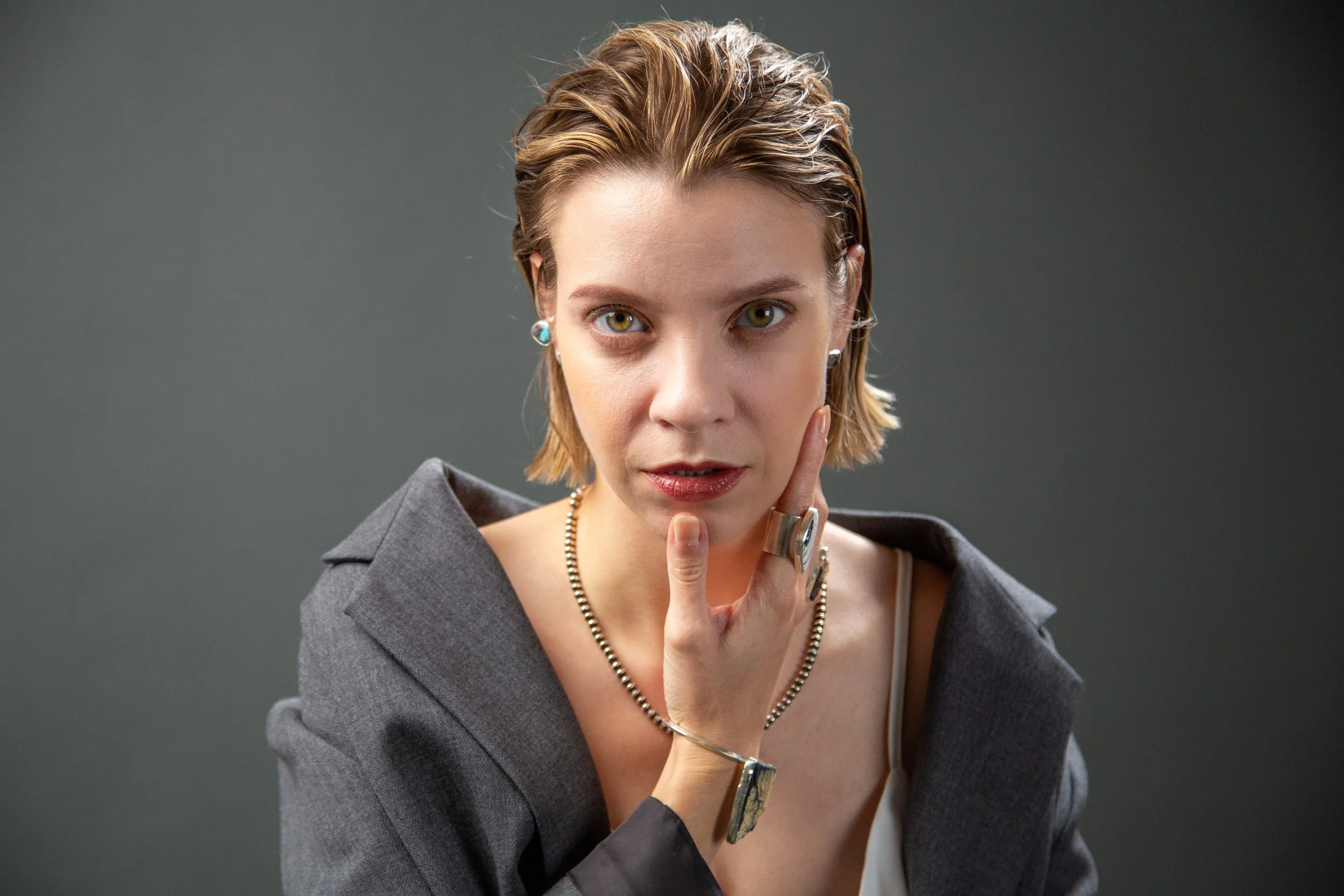 Intense portrait of model Emory Ä Takagi with statement jewelry photographed for Sycamore 2025 brand visuals