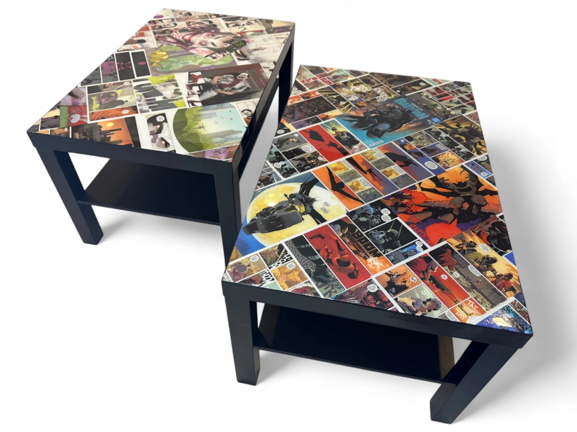 Two tables with comic book cover collages on their surfaces. The tables have black legs and a lower shelf, placed against a white background.