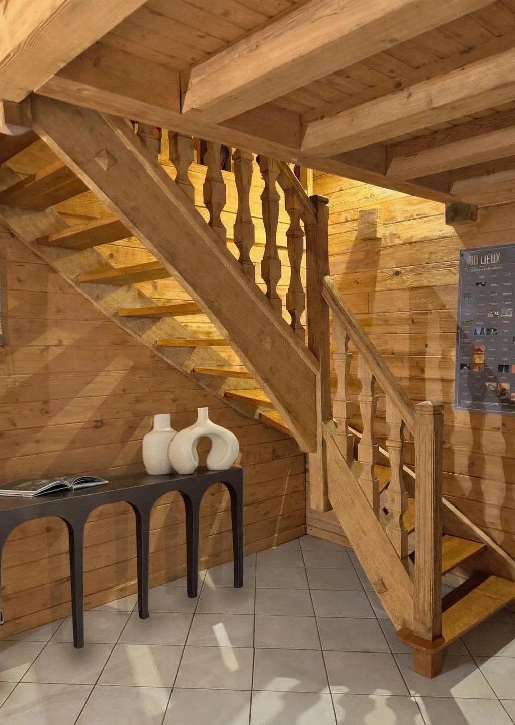 Vue rapprochée d’un espace de vie rénové dans un chalet, équilibre entre simplicité, confort et design moderne.