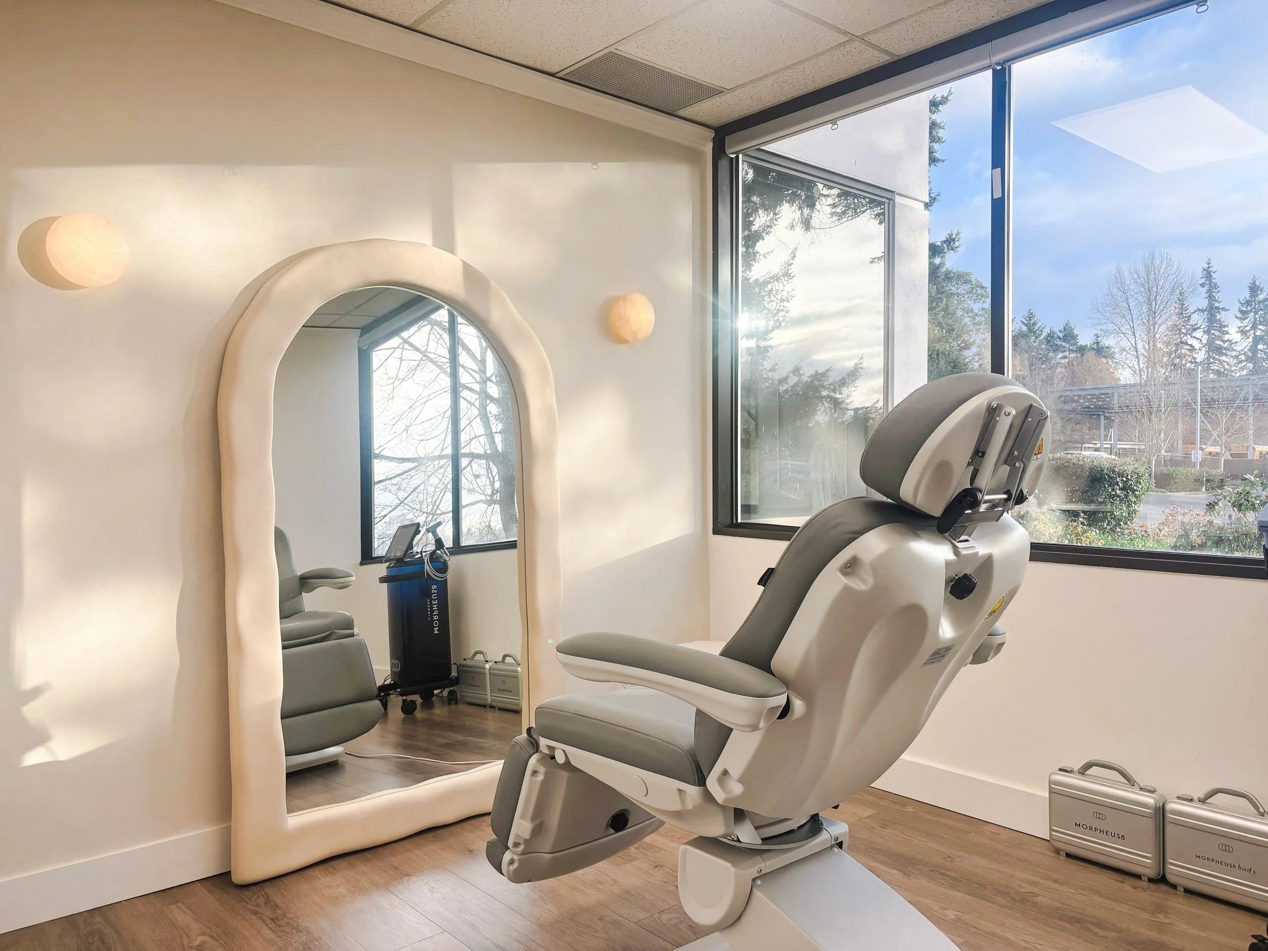 Clean, professional medical spa treatment room with neutral tones at O2 Aesthetics in Mercer Island