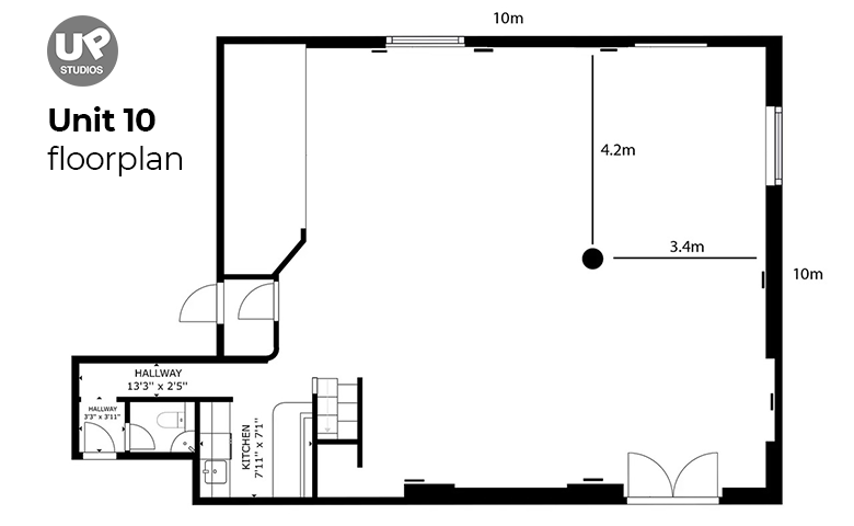 Floor plan of Unit 10 showing a large open area measuring 4.2 meters by 3.4 meters, a hallway of 13'3" by 2'5" with two doors, a kitchen measuring 7'11" by 7'1", and an entrance with double doors, with a scale of 10 meters.