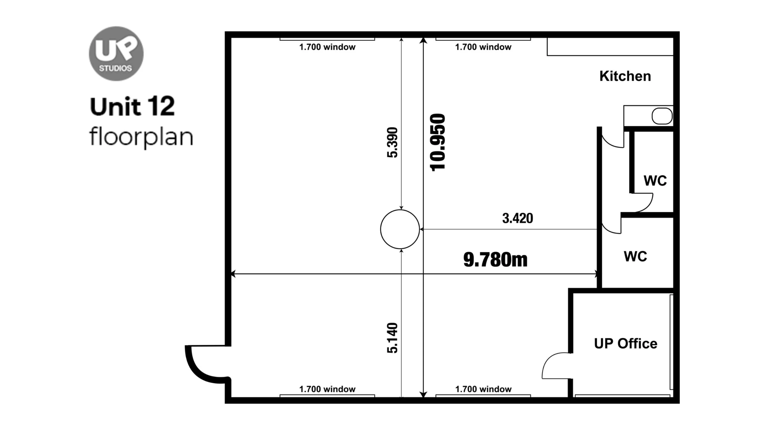Floor plan of Unit 12 featuring a main open space with dimensions 10.95 meters by 9.78 meters, a kitchen, two WC rooms, and an UP Office, with windows along the top and bottom walls.