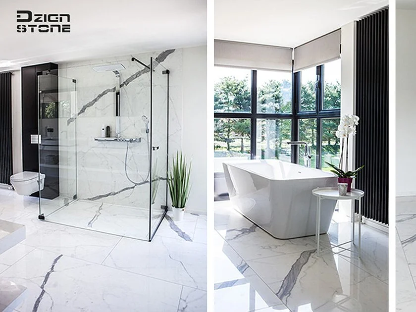 Modern bathroom with a glass-enclosed shower on the left and a bathtub near large windows on the right, both with white marble flooring and black accents.
