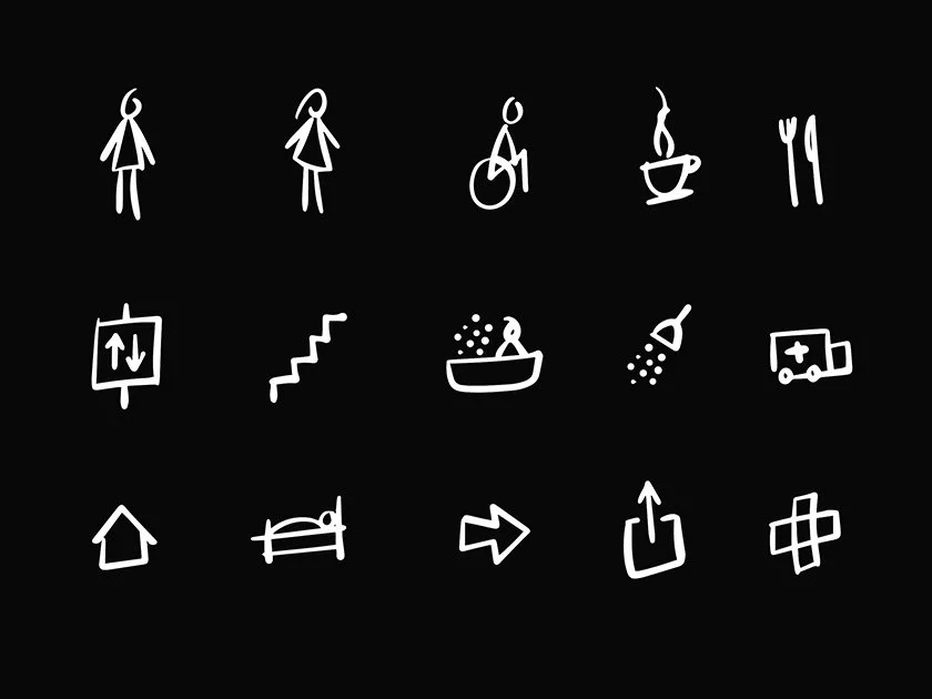 A series of white doodle icons on a black background representing various symbols such as people, a wheelchair, a steaming cup, utensils, an elevator, stairs, a bath, snow, a medical kit, a house, a bed, a right arrow, a share icon, and a cross.