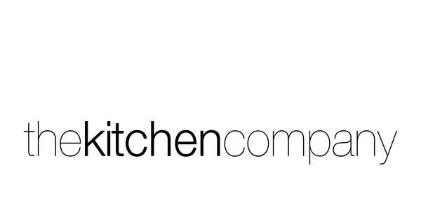 Logo of The Kitchen Company in black and white with stylized text.