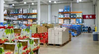Inside a warehouse showing rows of stock
