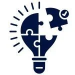 A heart-shaped light bulb made of puzzle pieces, with some pieces missing.