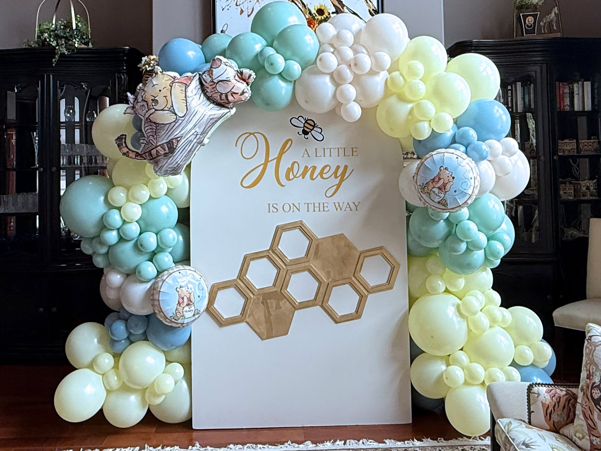 Bee-utiful and sweet! 🐝✨
Our &ldquo;A Little Honey is on the Way&rdquo; baby shower setup featured a wooden arch with a glowing balloon garland, a cute honeycomb wooden prop, and personalized vinyl signage &mdash; the perfect way to celebrate the mo