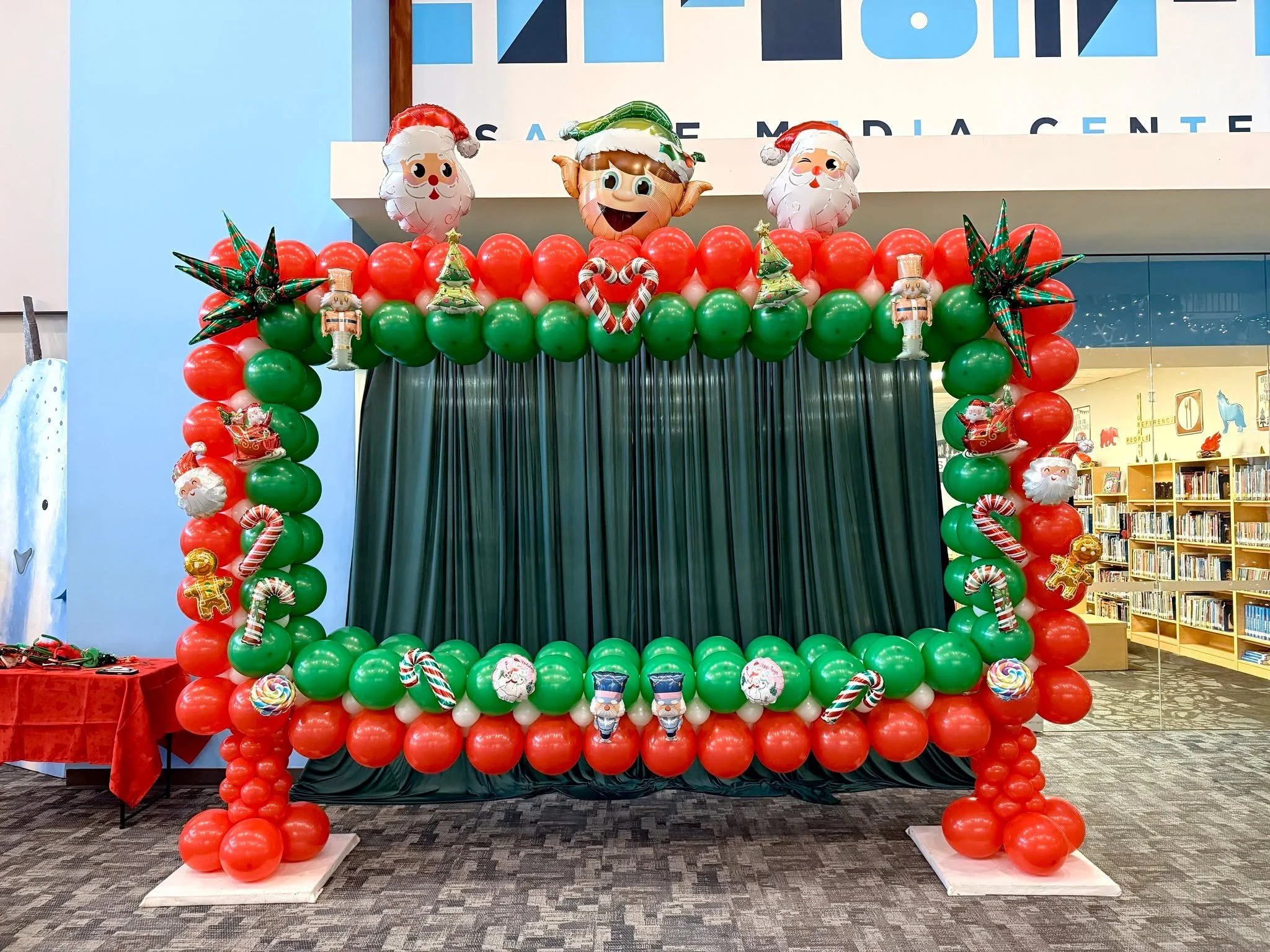 Christmas photo frame at Southside Christian School bringing holiday cheer and smiles! 🎄📸✨ The festive setup created the perfect spot for students, staff, and families to capture joyful Christmas memories. 🎅🎉

Kristy's Balloon Decorations
Balloon