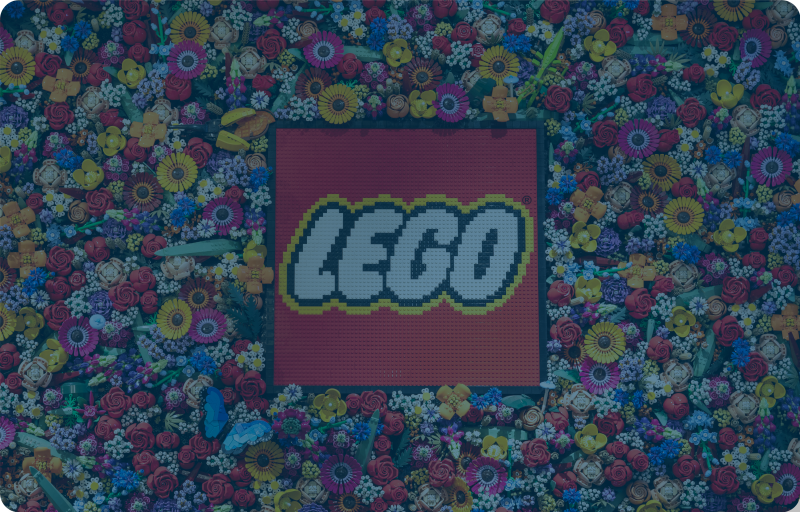 Lego Logo on background with flowers