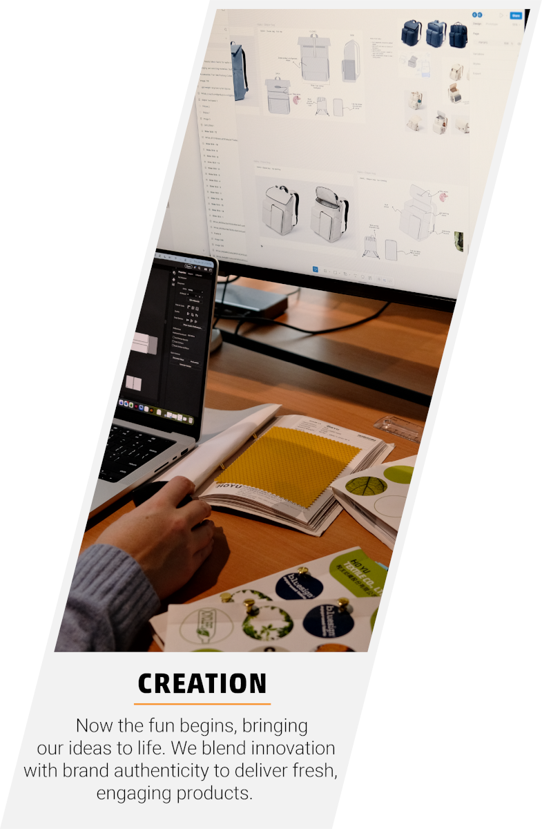 Creation text; desk with monitor and design items