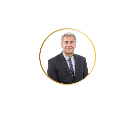 A professional portrait of Tarun Kapur CBE CEO of a multi academy trust comprising 11 schools