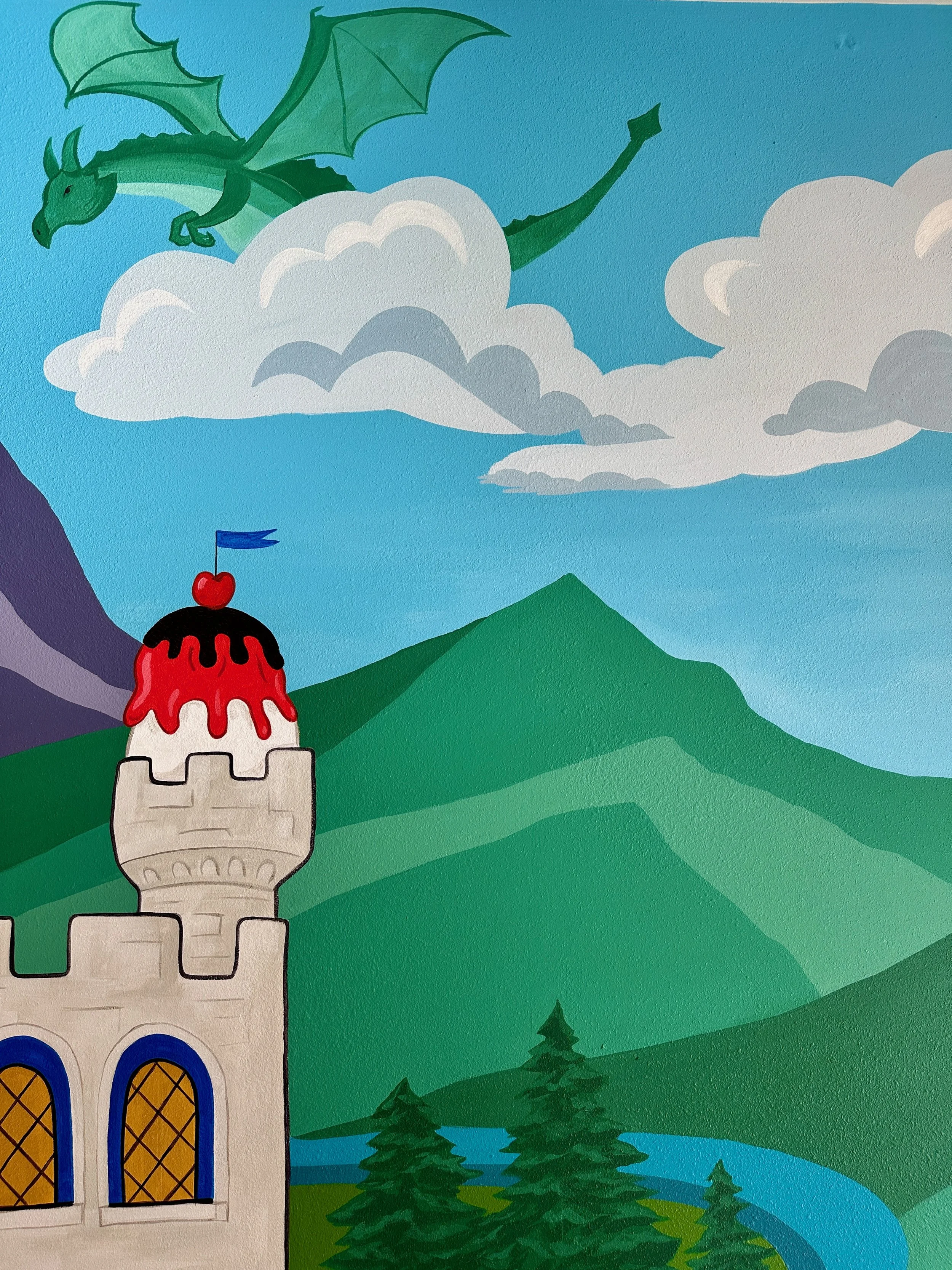 A cartoon-style painting of a castle tower with a cherry-topped ice cream sundae on top, two trees, a river, mountain, clouds, a flying green dragon, and a blue sky.