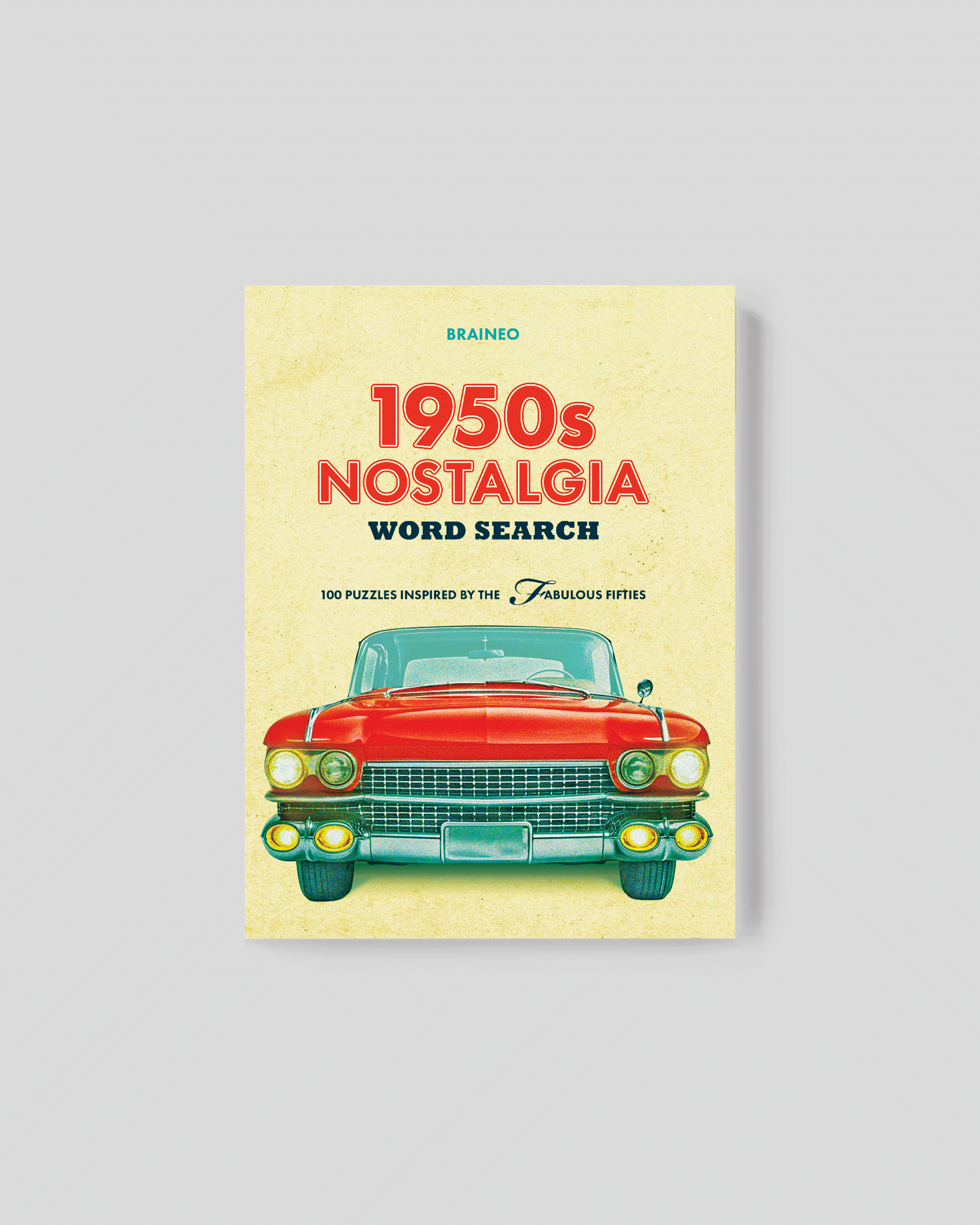 1950s Nostalgia Word Search paperback book cover featuring a classic red car, 100 themed word search puzzles, and standard-difficulty 1950s-inspired activities.