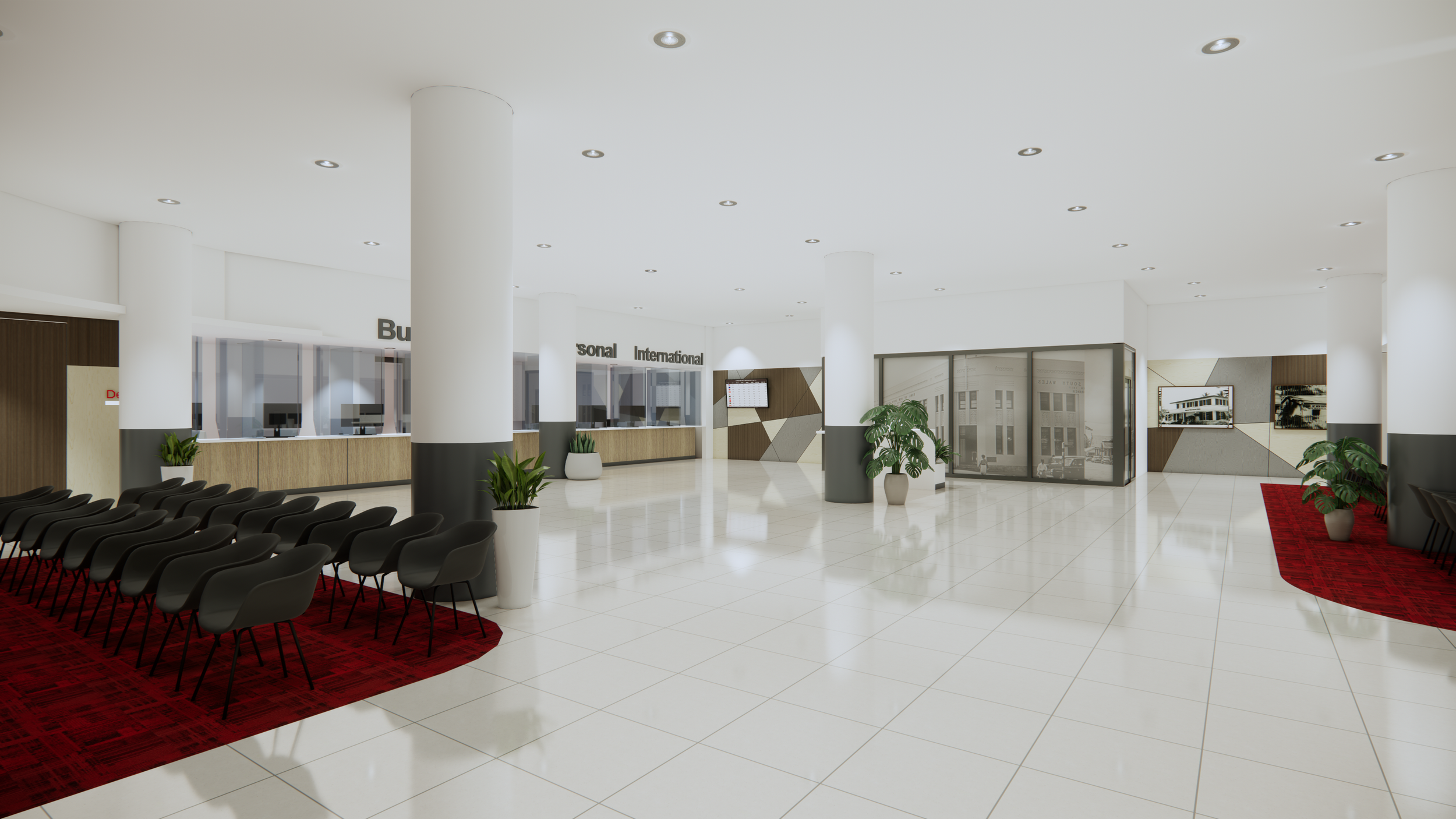 Modern, spacious building lobby with white tile flooring, white walls, large columns, and a red carpeted seating area with black chairs. Plants are placed throughout, and a reception desk is visible in the background.