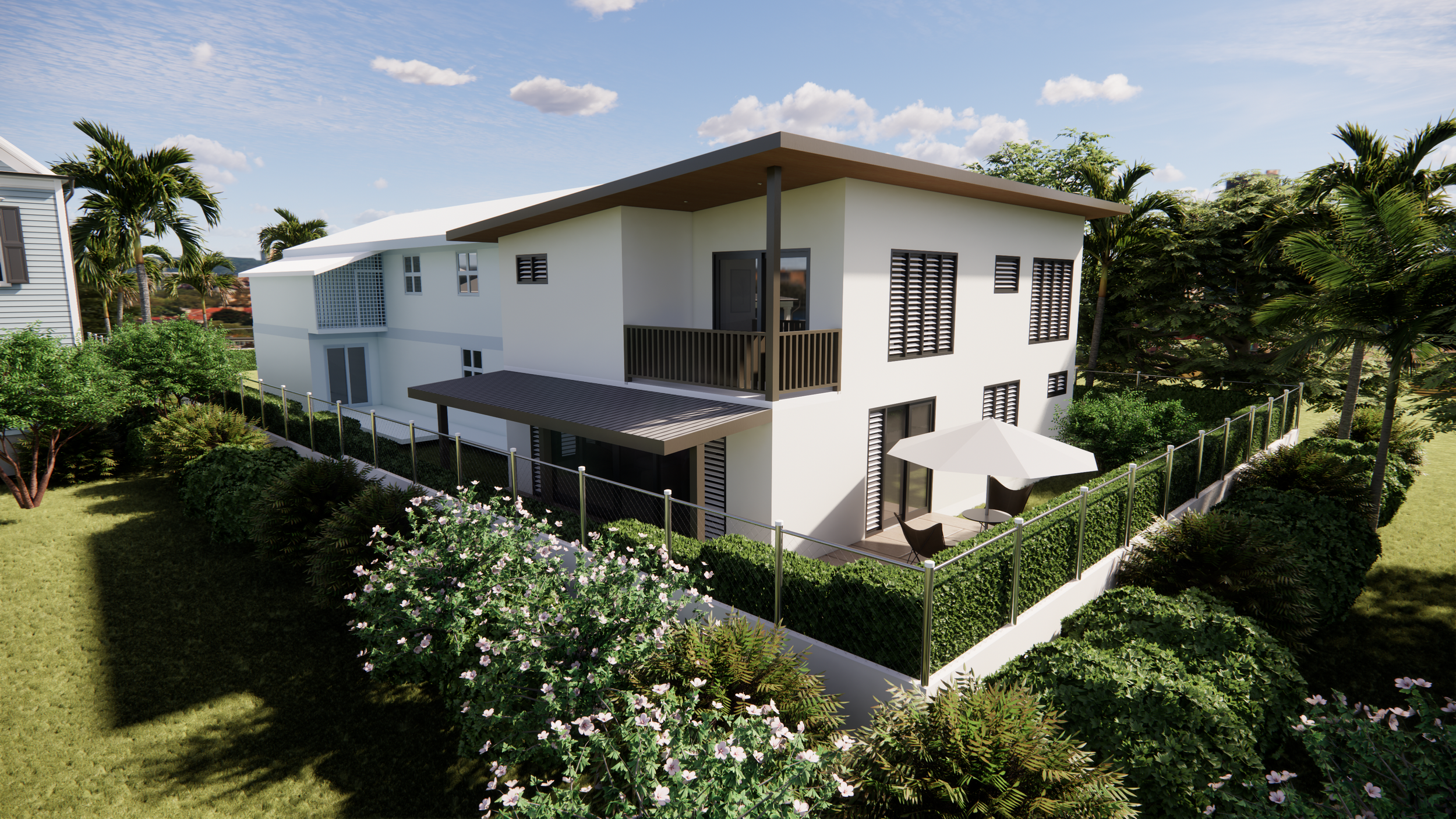 A modern two-story white house with a flat roof, a balcony on the second floor, and a small patio with a white umbrella and chairs in a lush garden with trees and flowers.