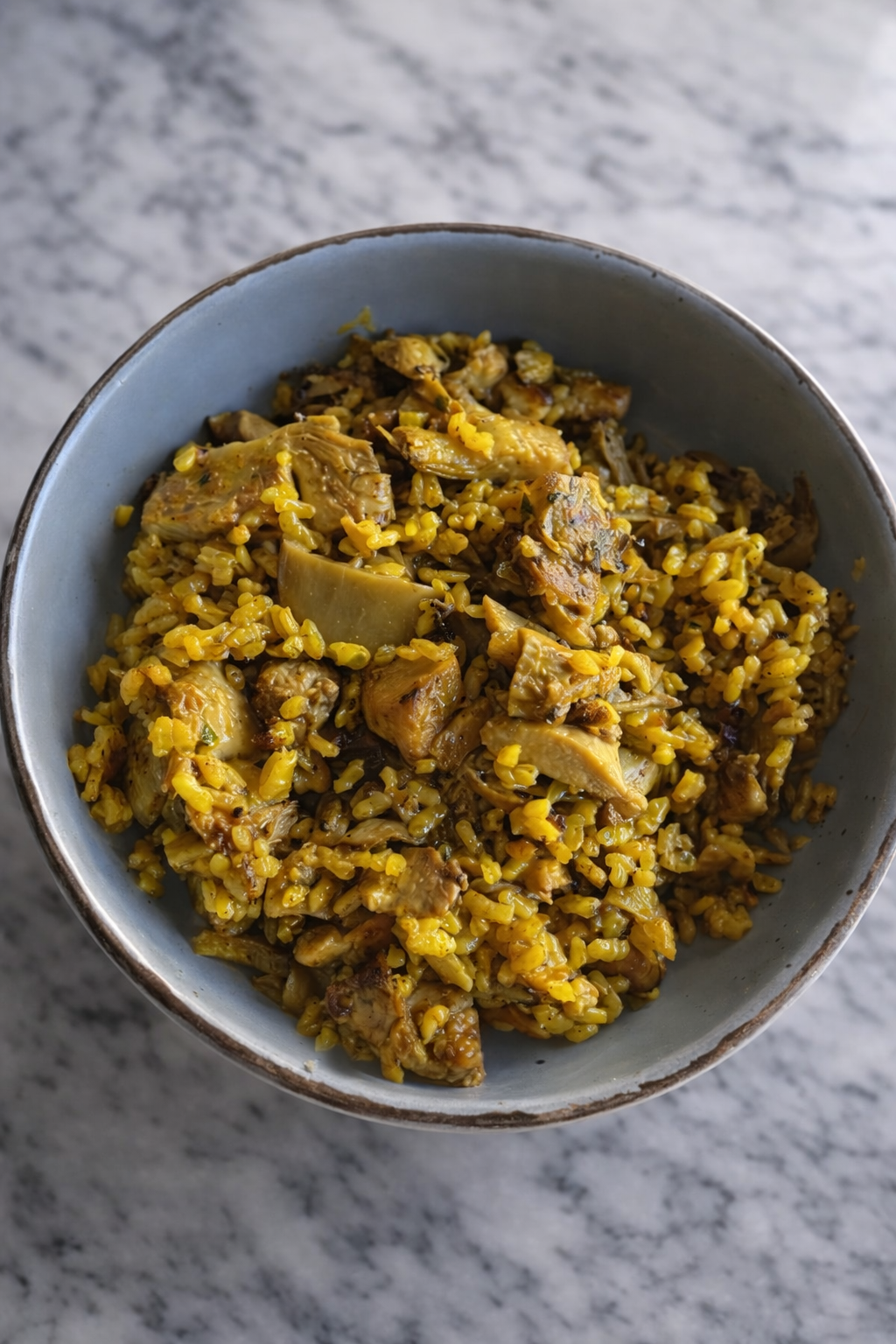 Arroz con setas, alcachofas y pollo