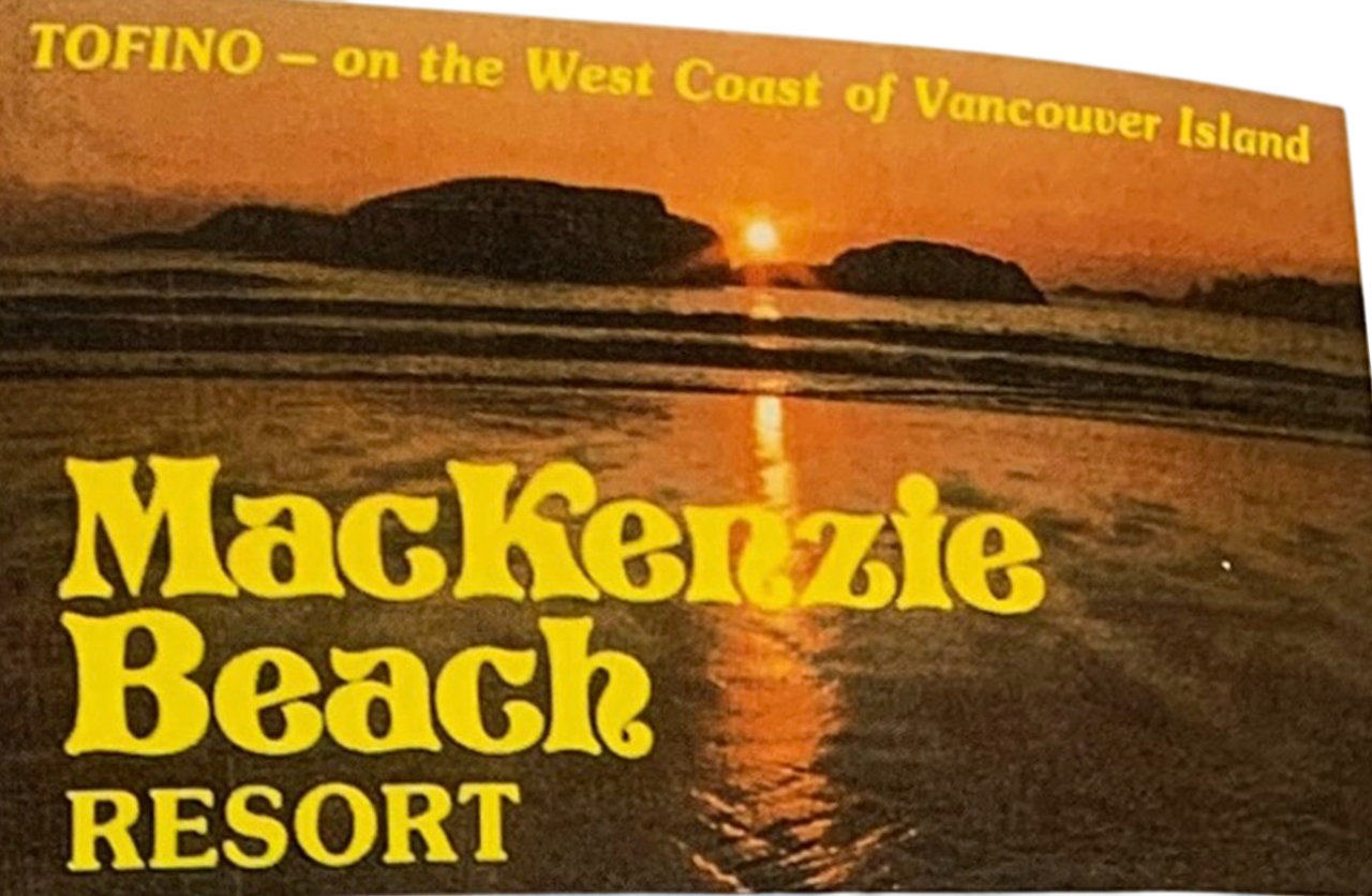 A vintage postcard, show a sunset over Mackenzie Beach, with the sun partially hidden behind rocks, casting a glow on the water.