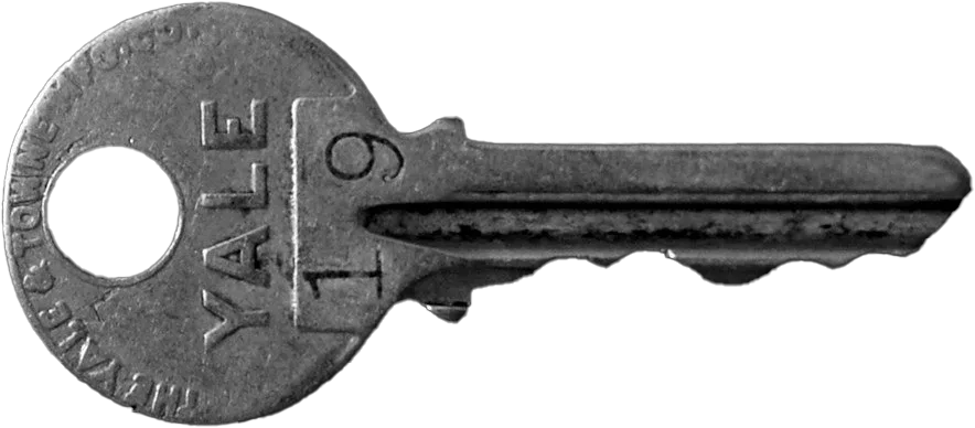 A metal key with the words 'Yale' and '11' engraved on the head, and the number '6' on the blade.