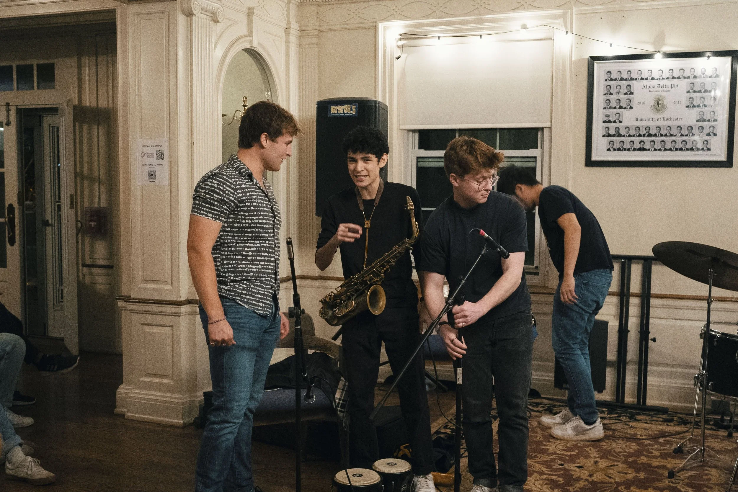 Jack Cunningham setting up mics for Eastman on Campus, a concert series ran by Alpha Delta Phi and WRUR (University of Rochester College Radio), where he was the head live engineer and ran recording, mixing, and mastering after the event.