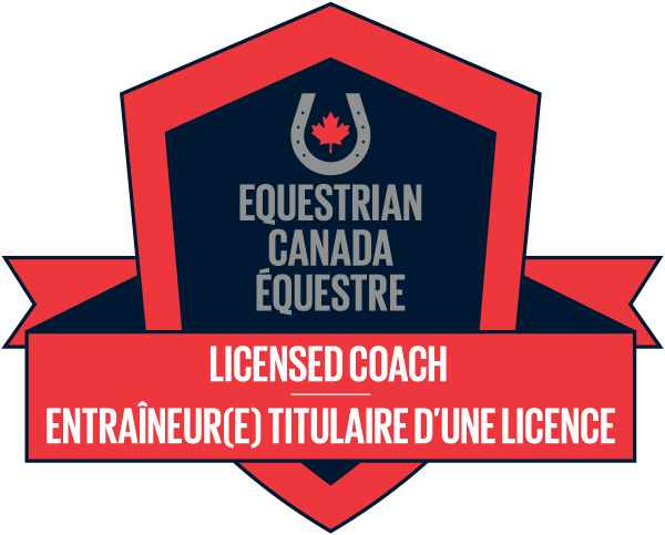 A badge with a red and navy shield shape, featuring a horseshoe with a maple leaf at the top, and the words "EQUESTRIAN CANADA ÉQUESTRE" in the center. A red banner at the bottom states "LICENSED COACH ENTRAÎNEUR(E) TITULAIRE D’UNE LICENCE."