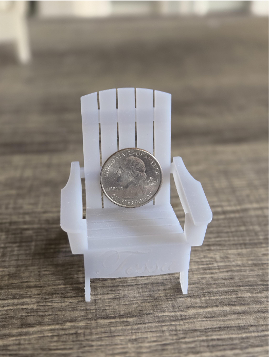 Small chair with quarter for scale.