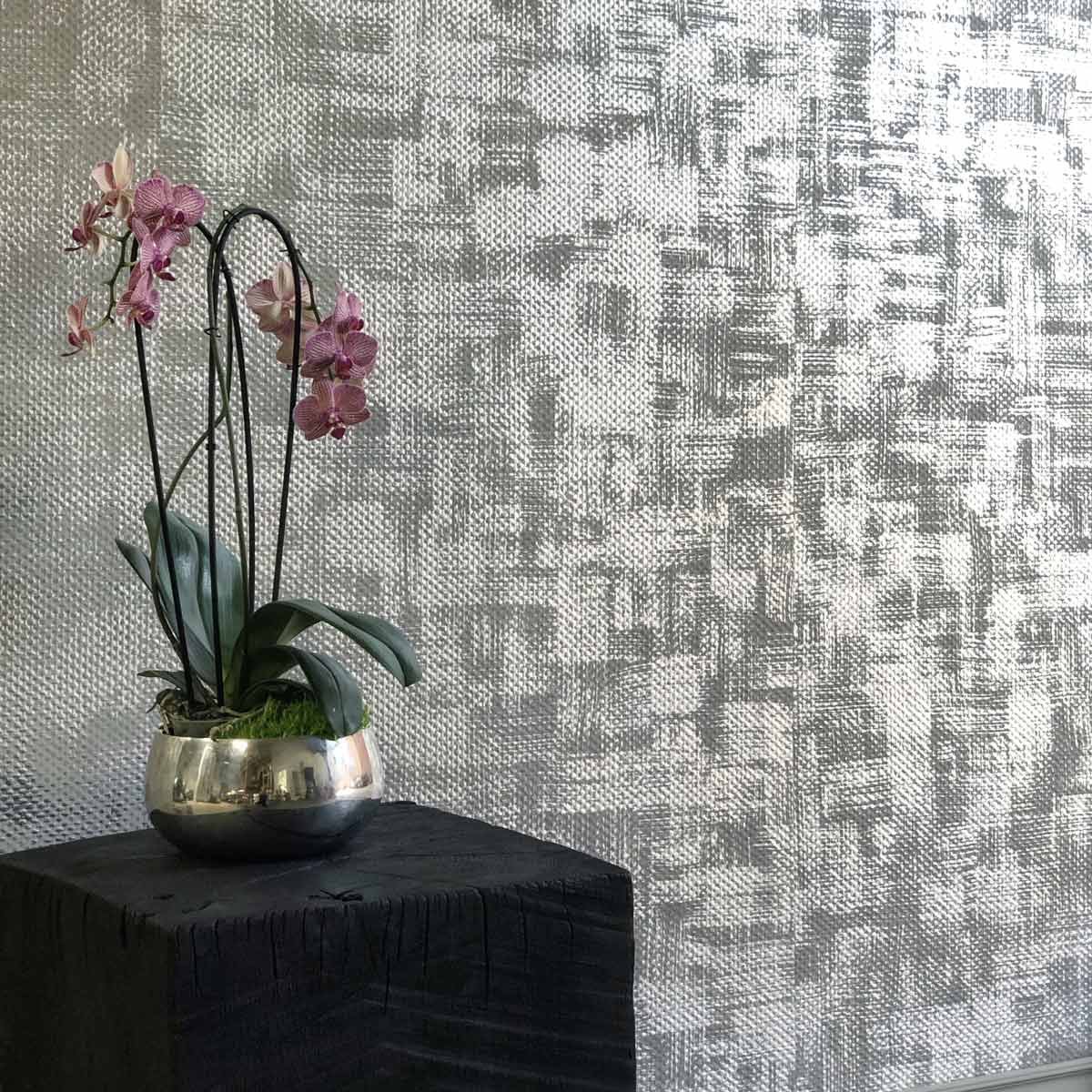  Plaited Leaf Rex Silver  • SKU 19-0641 • Troweled marble plaster on a chunky woven glass textile, sealed with mica embedded beeswax. This paper elegantly covers imperfect walls.