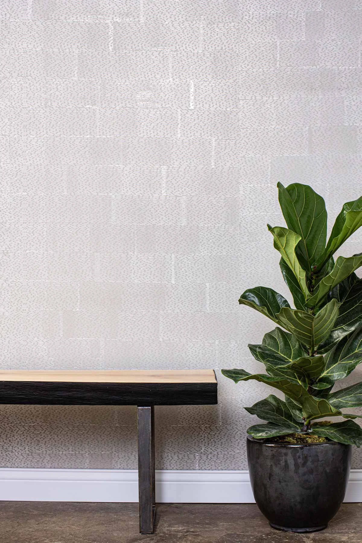  Marcato Putty  • SKU 14-0192 • Every shimmering check applied by hand to marble plaster surface. Sparkling metallic dashes make light dance across this paper.