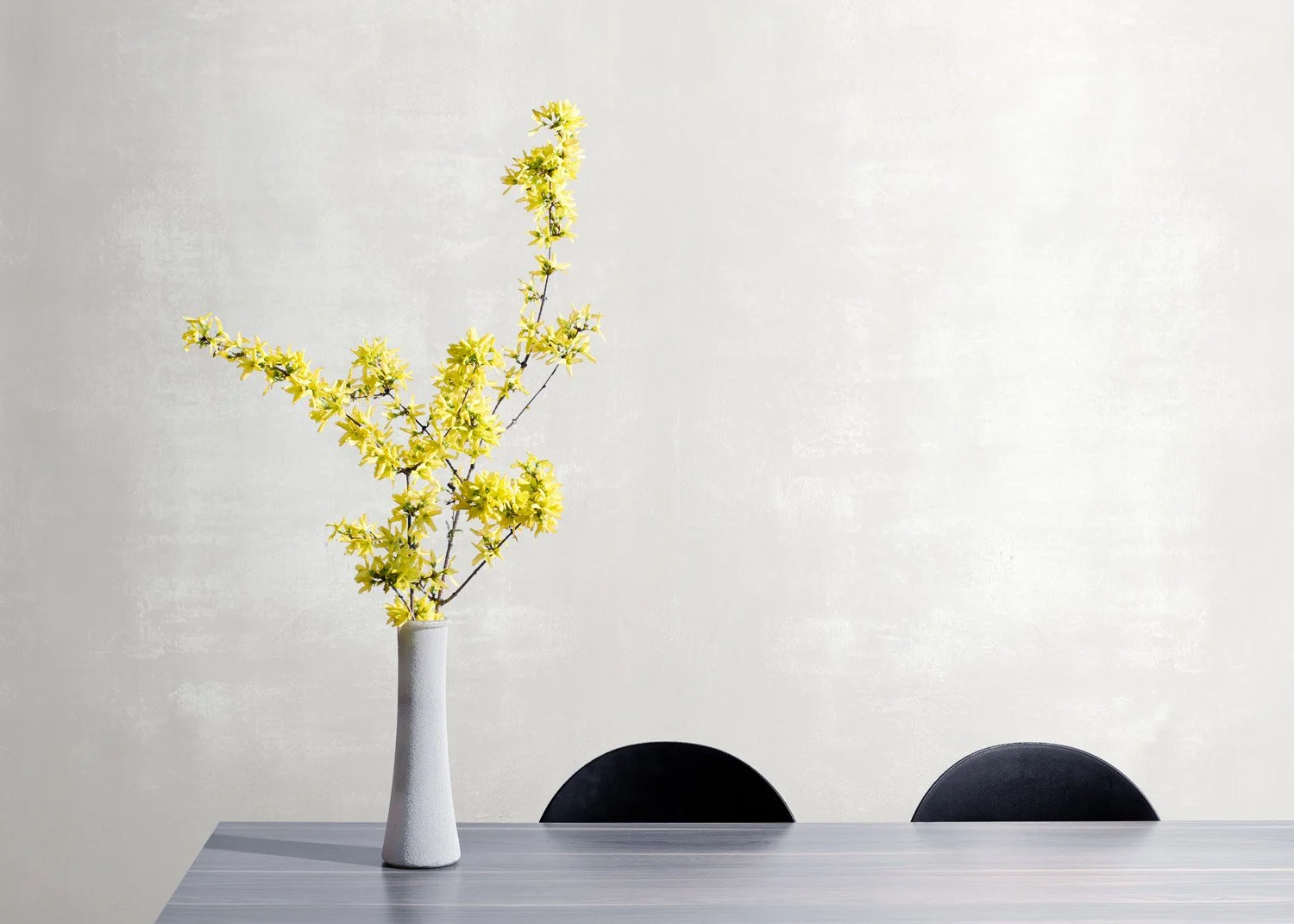  Oya Salt Pearl  • SKU 15-0249 • Hand-dyed paper troweled with plaster and flash-gilded with mica distressed this paper as it will dress a wall with gestural movement and an elegant play of light.