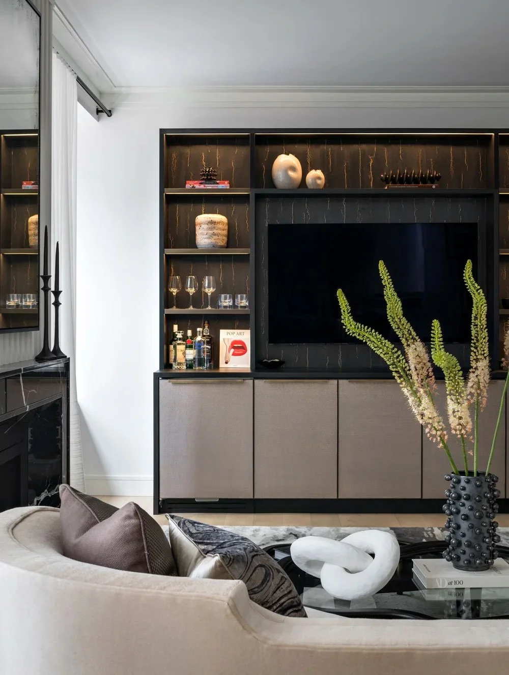  Abyss Jet  • SKU 19-0663 • Layers of hand-applied plaster encapsulating micaceous and metallic resins. This lustrous paper is reminiscent of the glowing interior of an abalone shell.