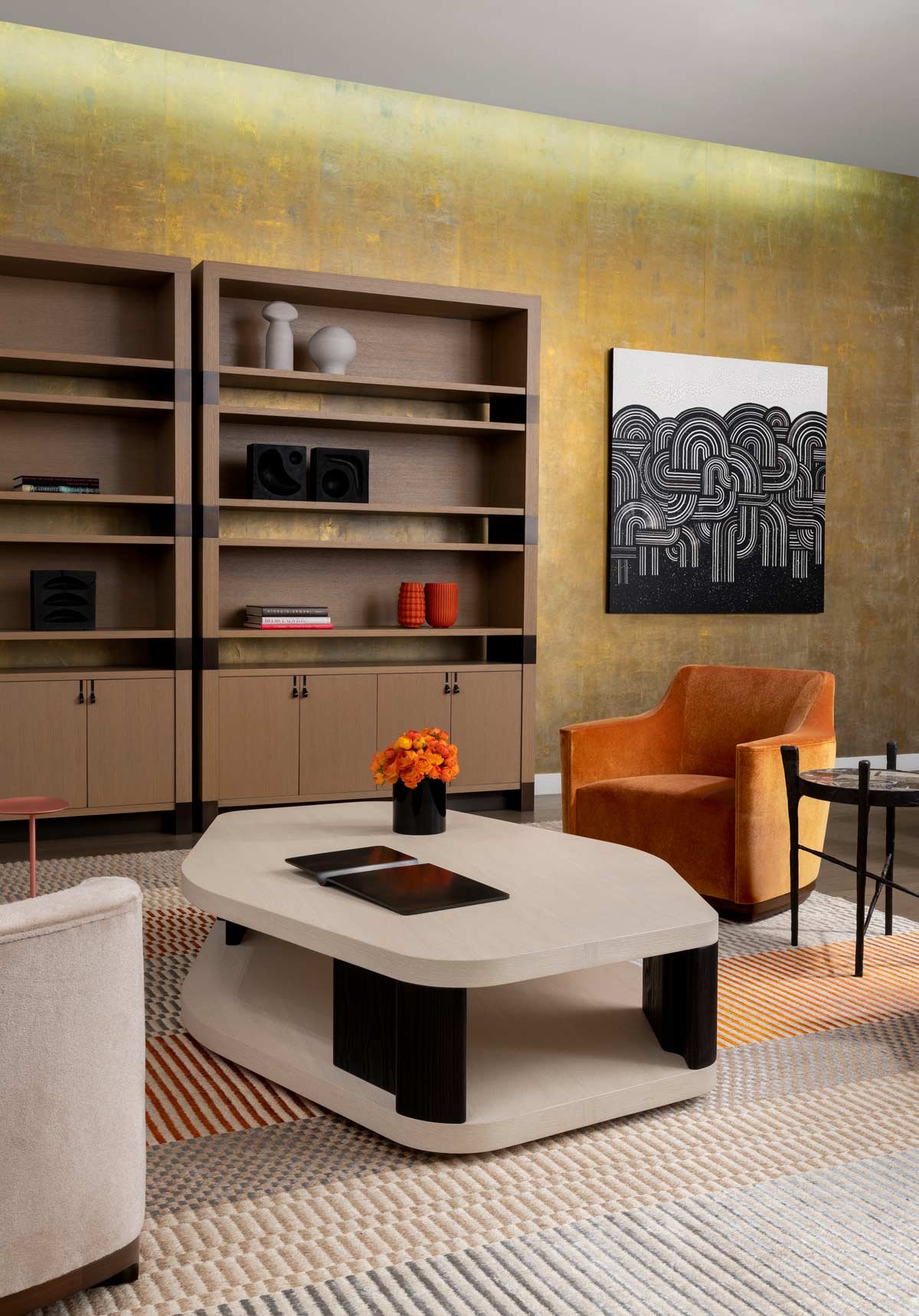  Oya Tidal Gold  • SKU 15-0221 • Hand-dyed paper troweled with plaster and flash-gilded with mica distressed this paper as it will dress a wall with gestural movement and an elegant play of light.