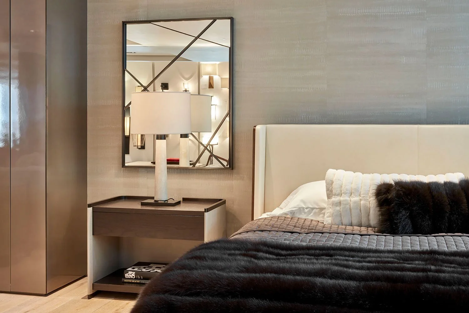  Lotic Stone  • SKU 14-0143 • Bands of undulating polished plaster finished with beeswax, this paper is reminiscent of waves at sea or reptilian skin.