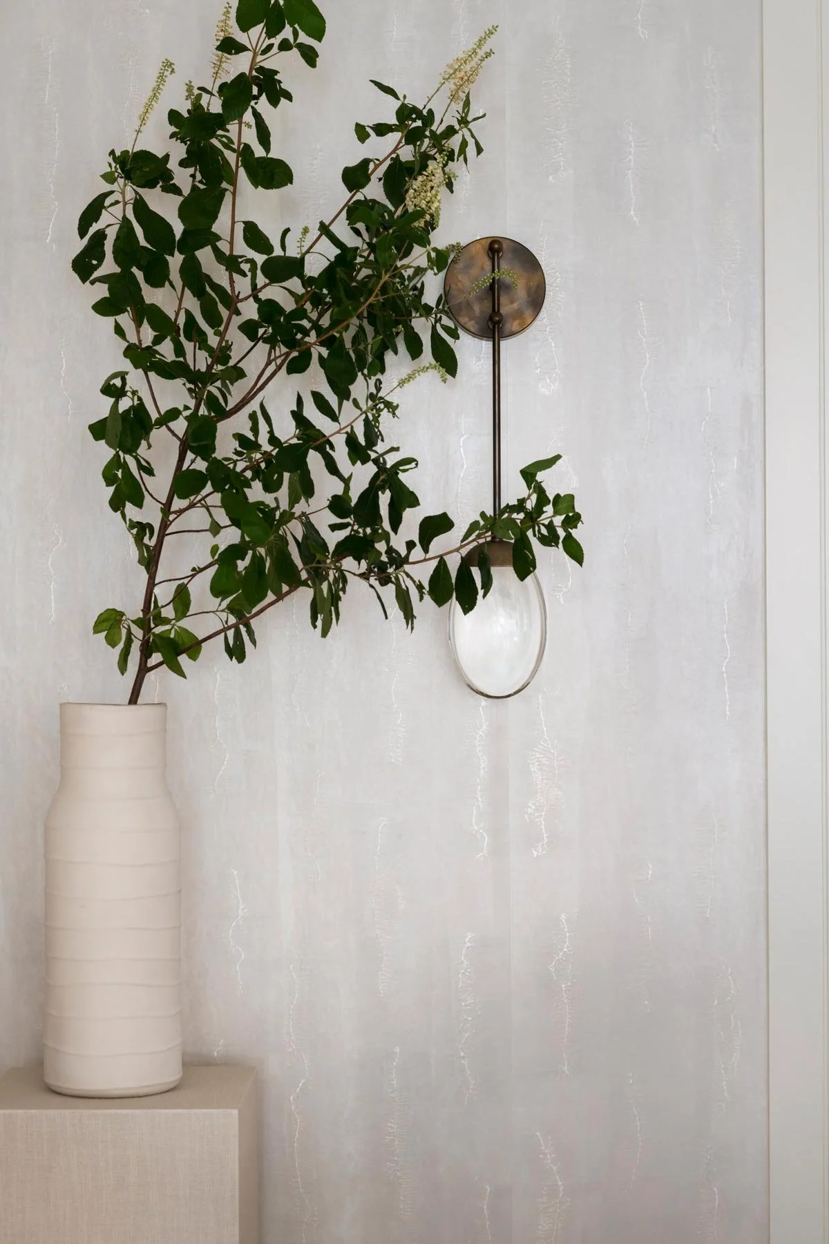  Abyss Pearl  • SKU 15-0195 • Layers of hand-applied plaster encapsulating micaceous and metallic resins. This lustrous paper is reminiscent of the glowing interior of an abalone shell.