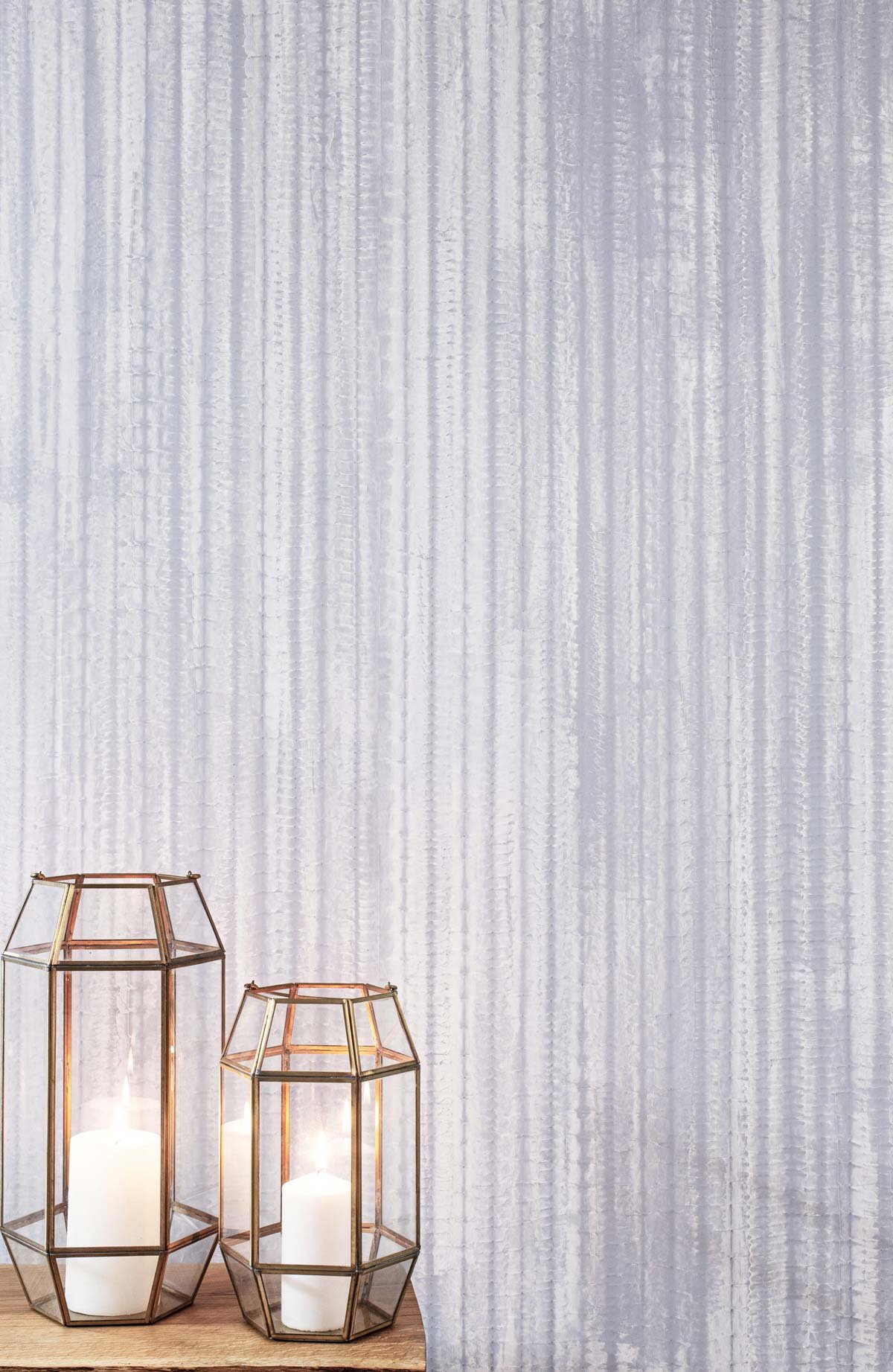  Arashi Periwinkle Salt  • SKU 15-0203 • Alternating passes of troweled and bladed marble plaster create this delicate and organic vertical stripe. The subtle variation in color and honed sheen reflect the beauty of the material.