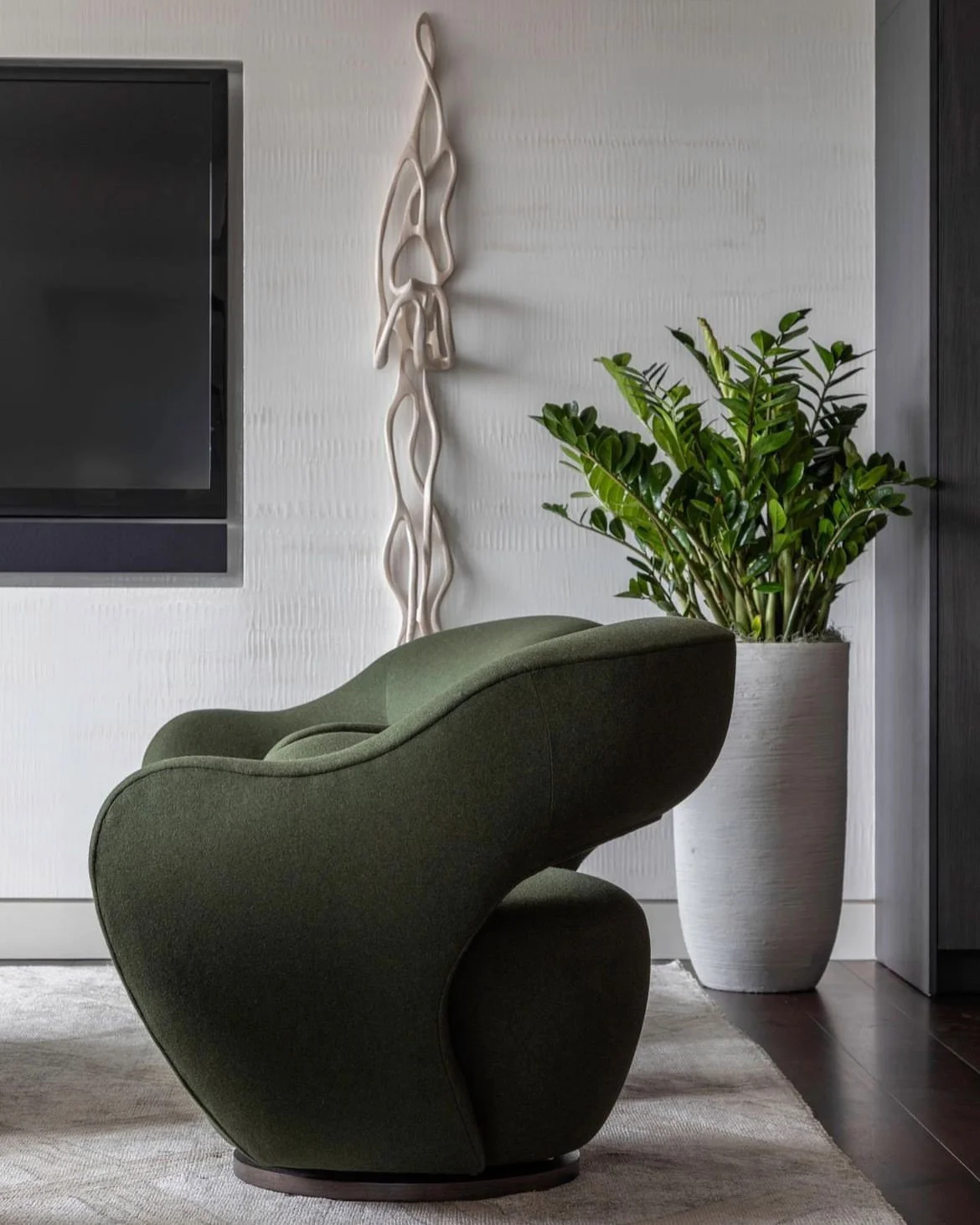  Lotic Salt  • SKU 14-0142 • Bands of undulating polished plaster finished with beeswax, this paper is reminiscent of waves at sea or reptilian skin.