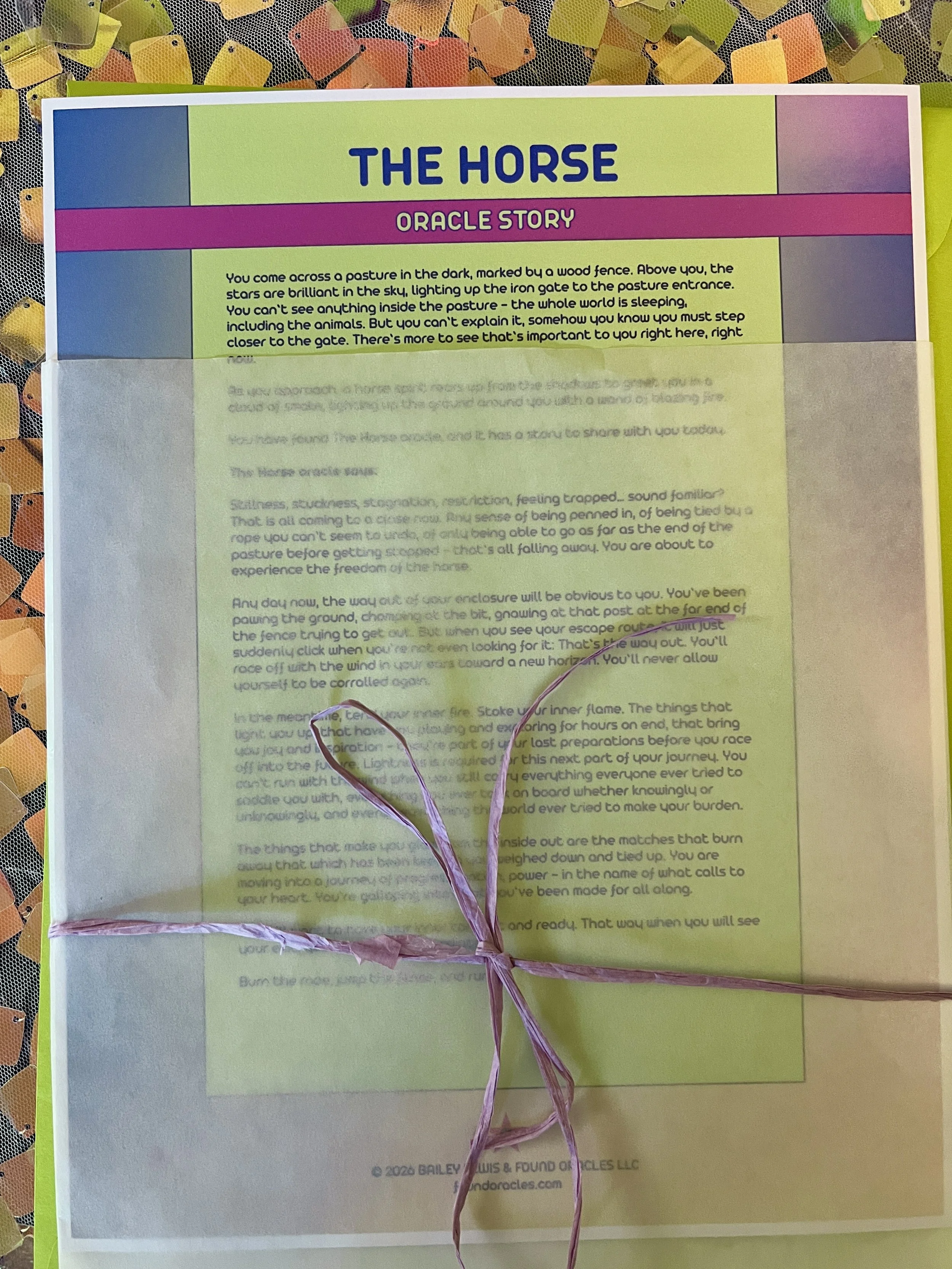 The Horse from Found Oracles printed story sheet peeking out of its glassine sleeve with story card visible inside.